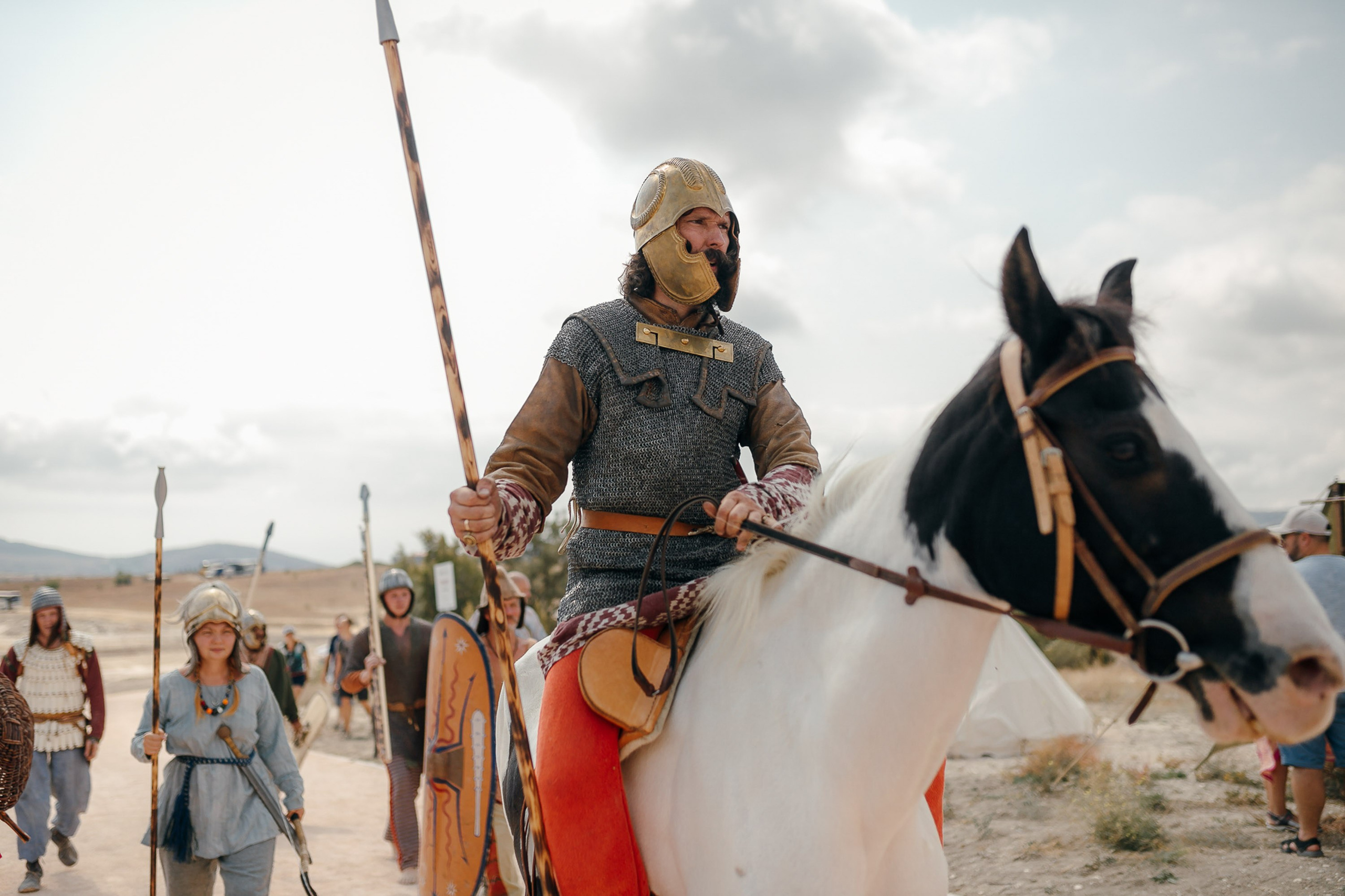 Historical reenactor on horseback with spear
