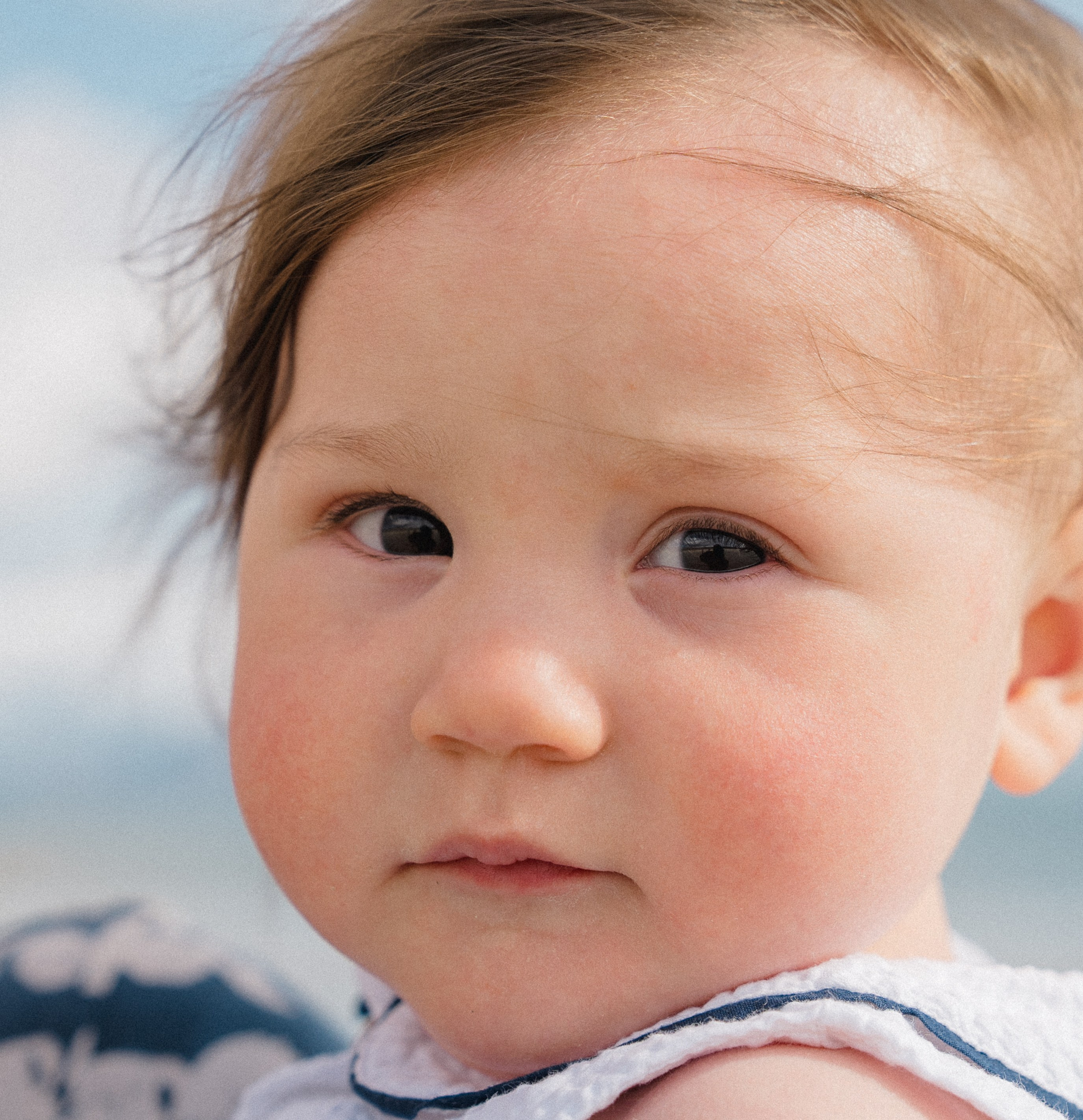 Darya and Mia at the ocean. Wedding and family photographer Ireland