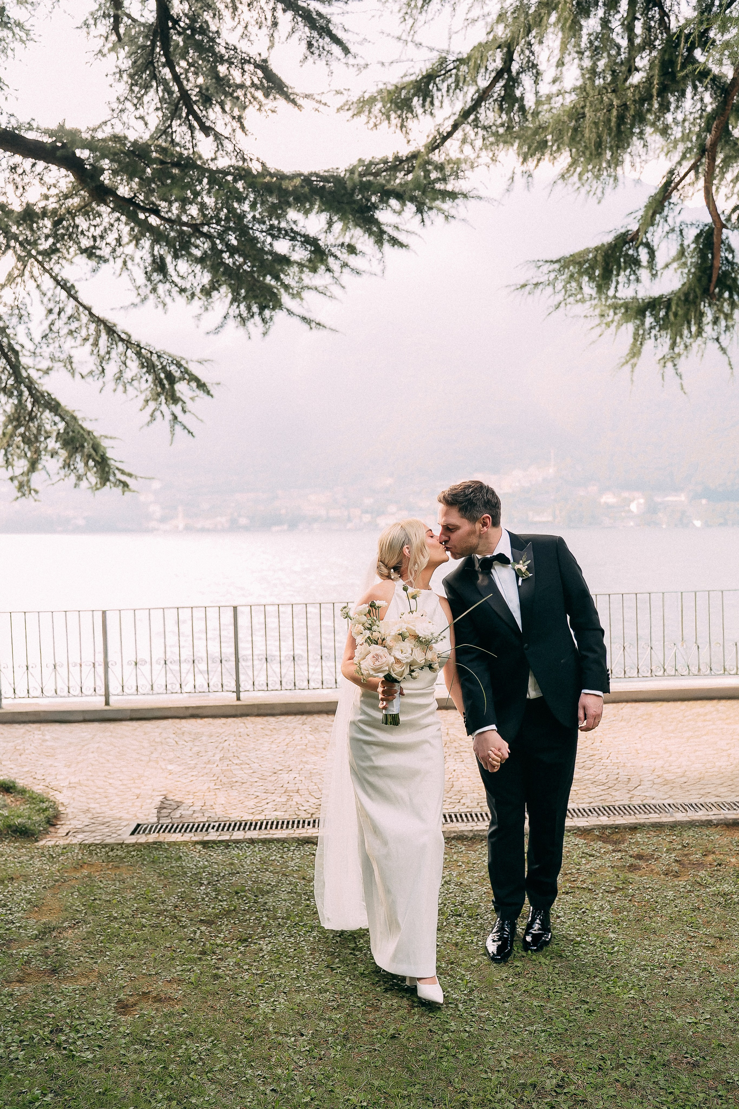 Bride and groom formal portrait under the trees at Villa Lario, Lake Como, Italy