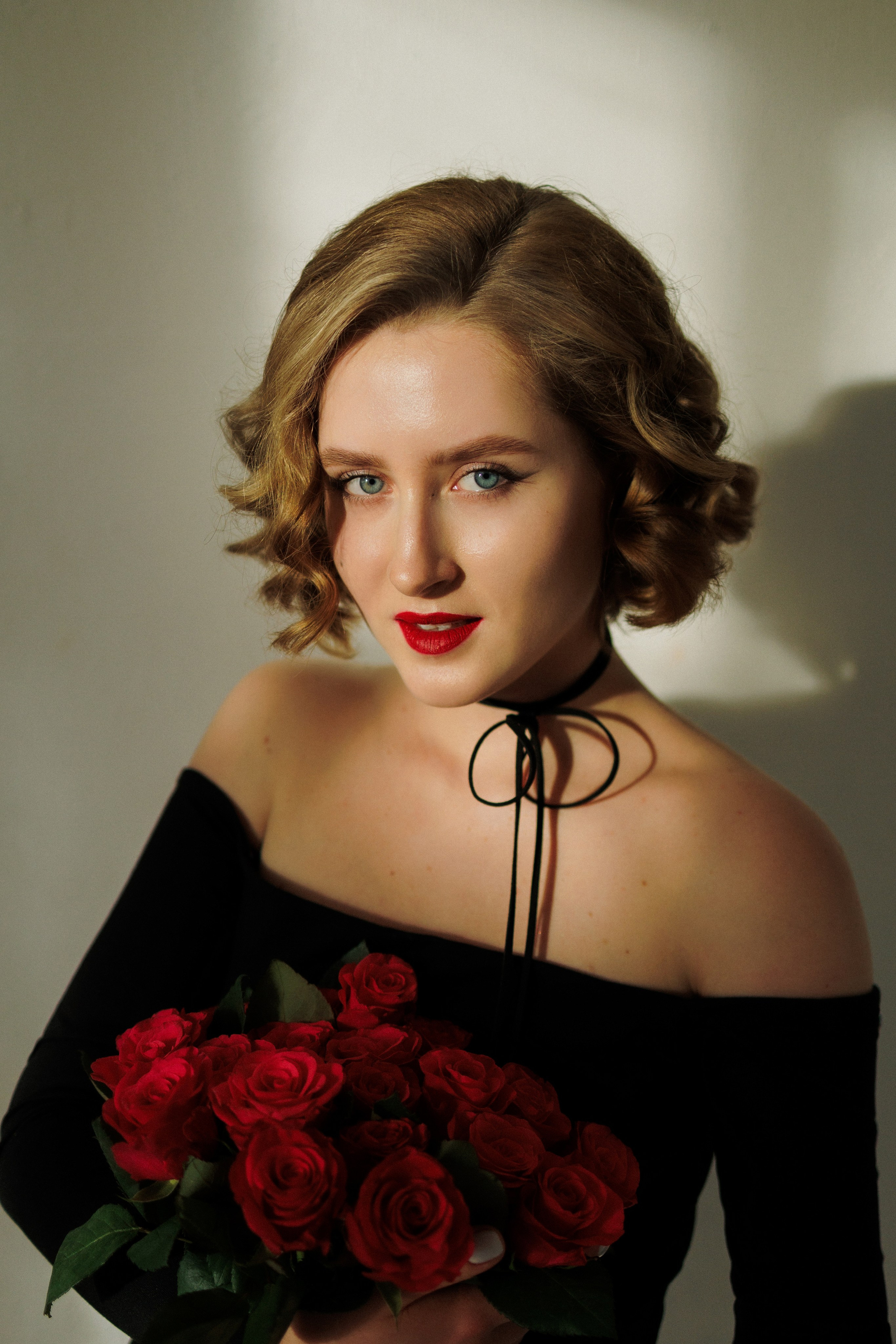 Soulful Studio Portrait. Woman in a Black Dress with Red Roses. Kristina Kozheltsova- Soulful Portrait&Lifestyle&Love Story Photographer in Leipzig, Germany