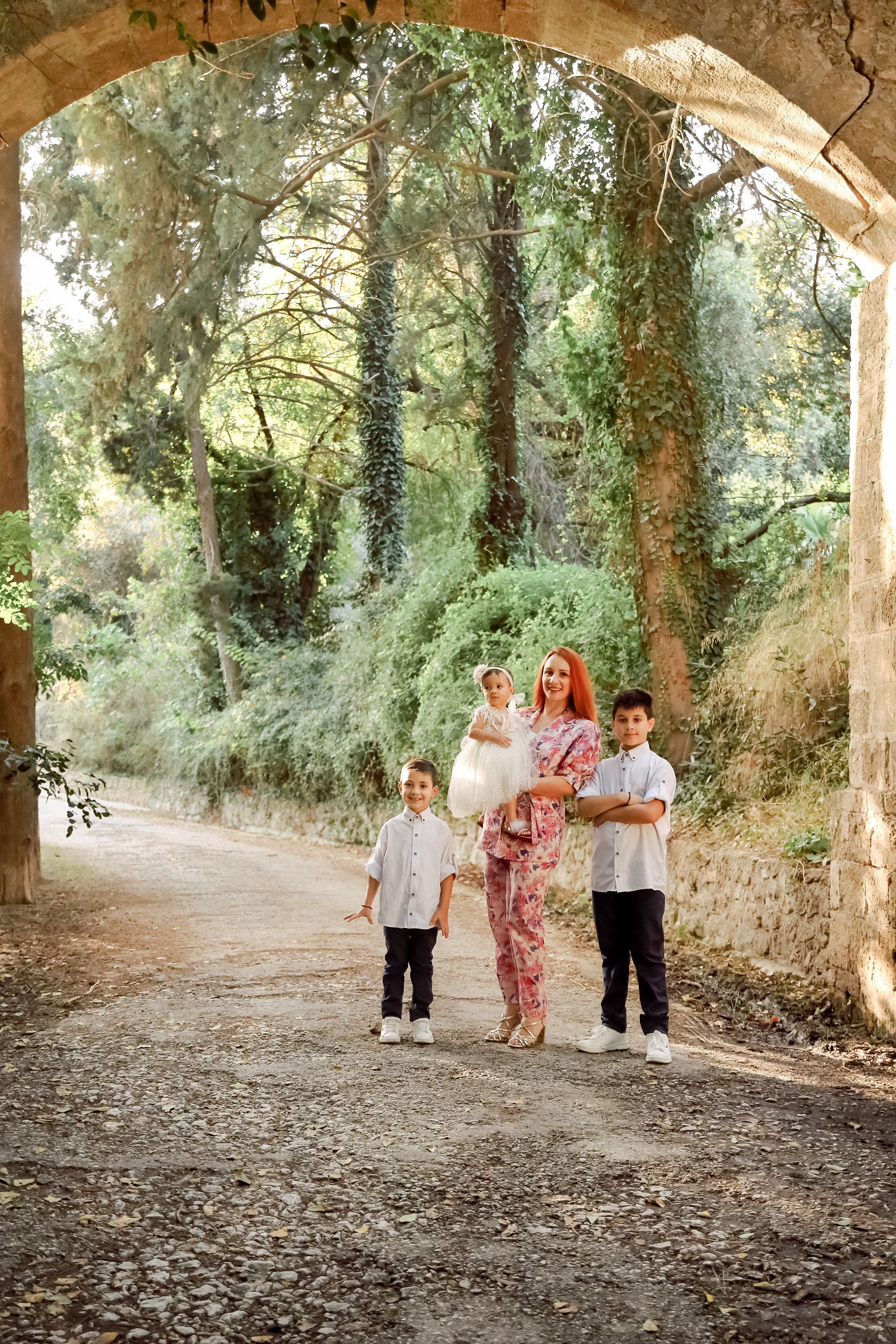 A happy family is enjoying its time in a park. Greece, Rhodes island