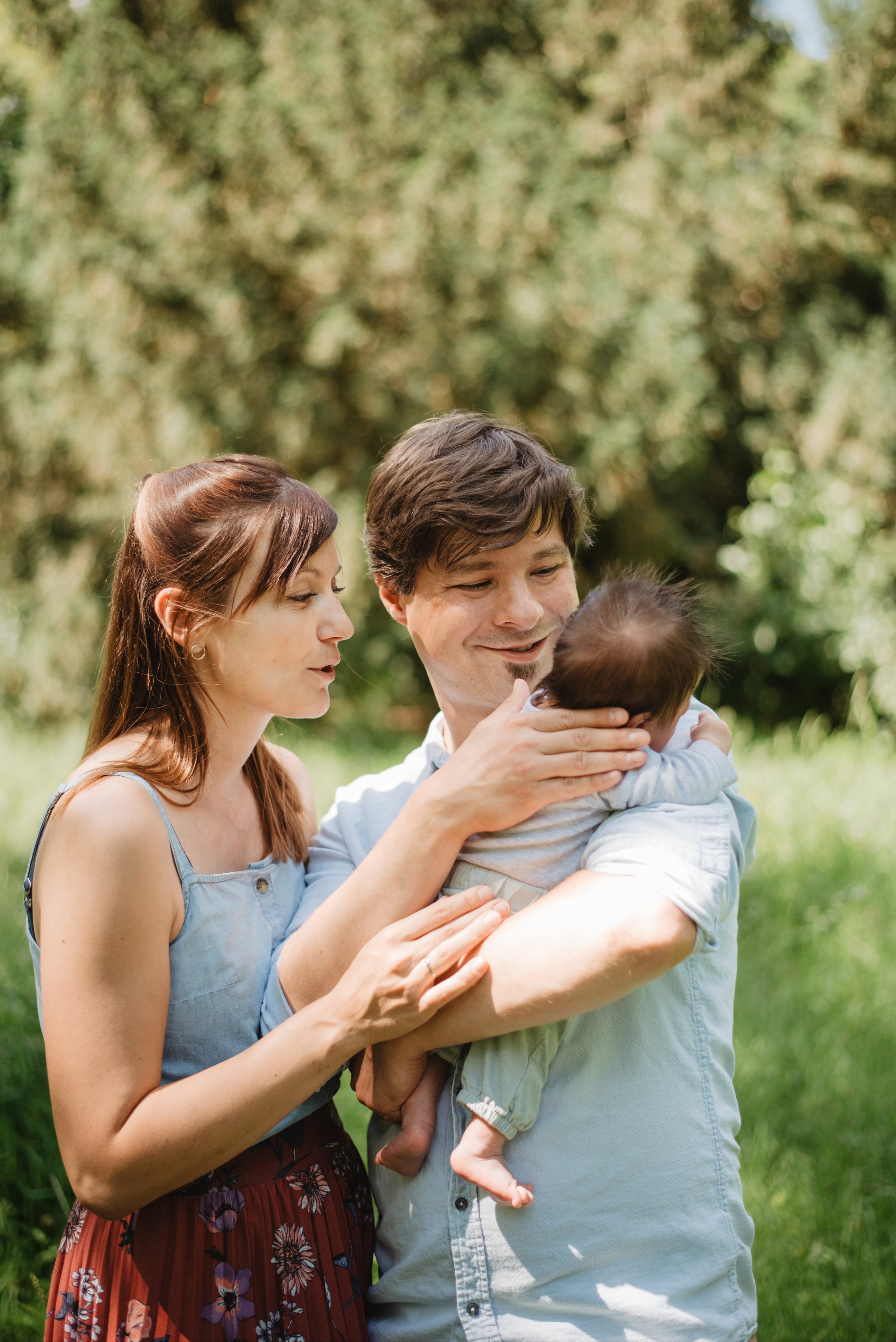 Family photography in park. Lifestyle, wedding and family photographer