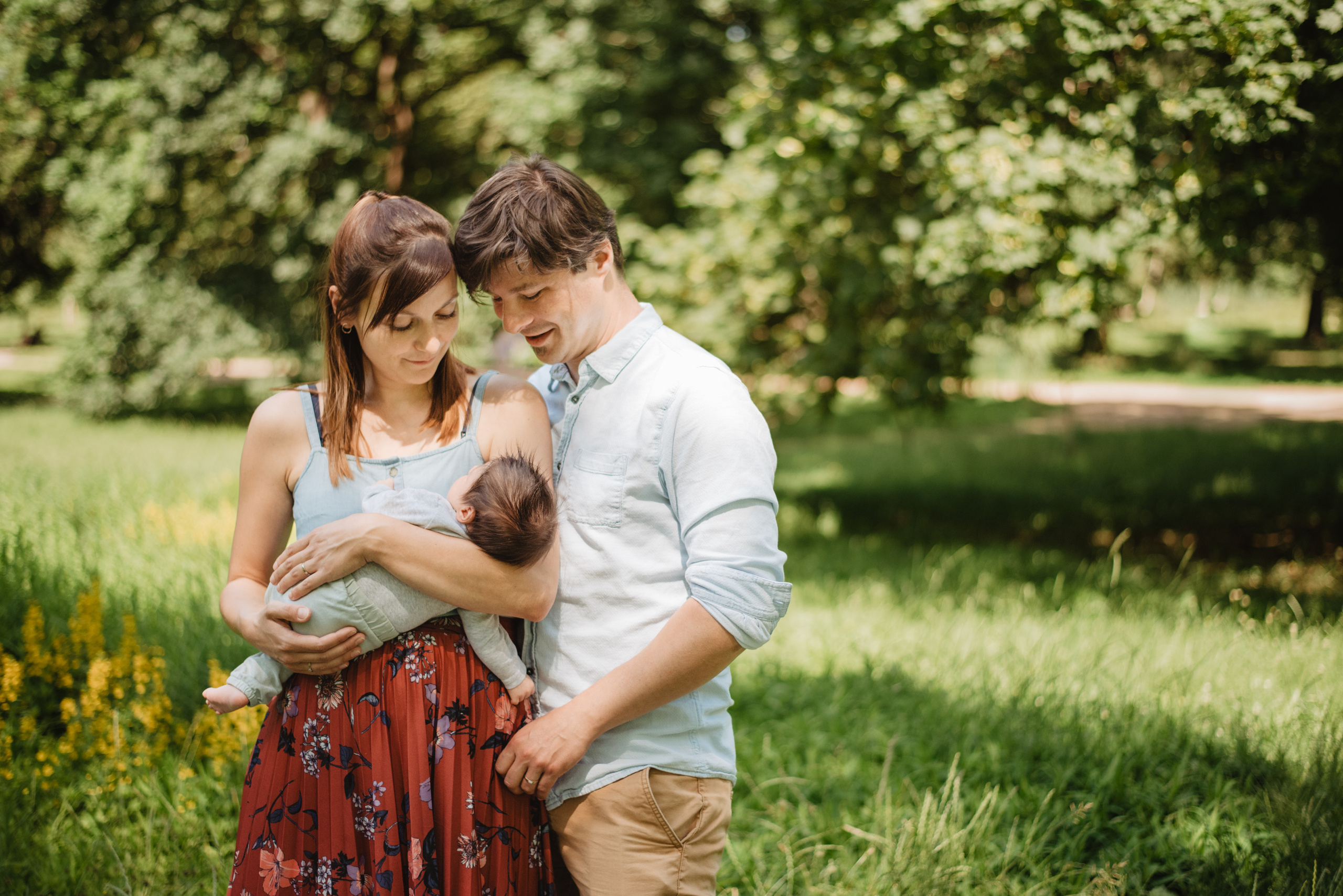 Family photography in park. Lifestyle, wedding and family photographer