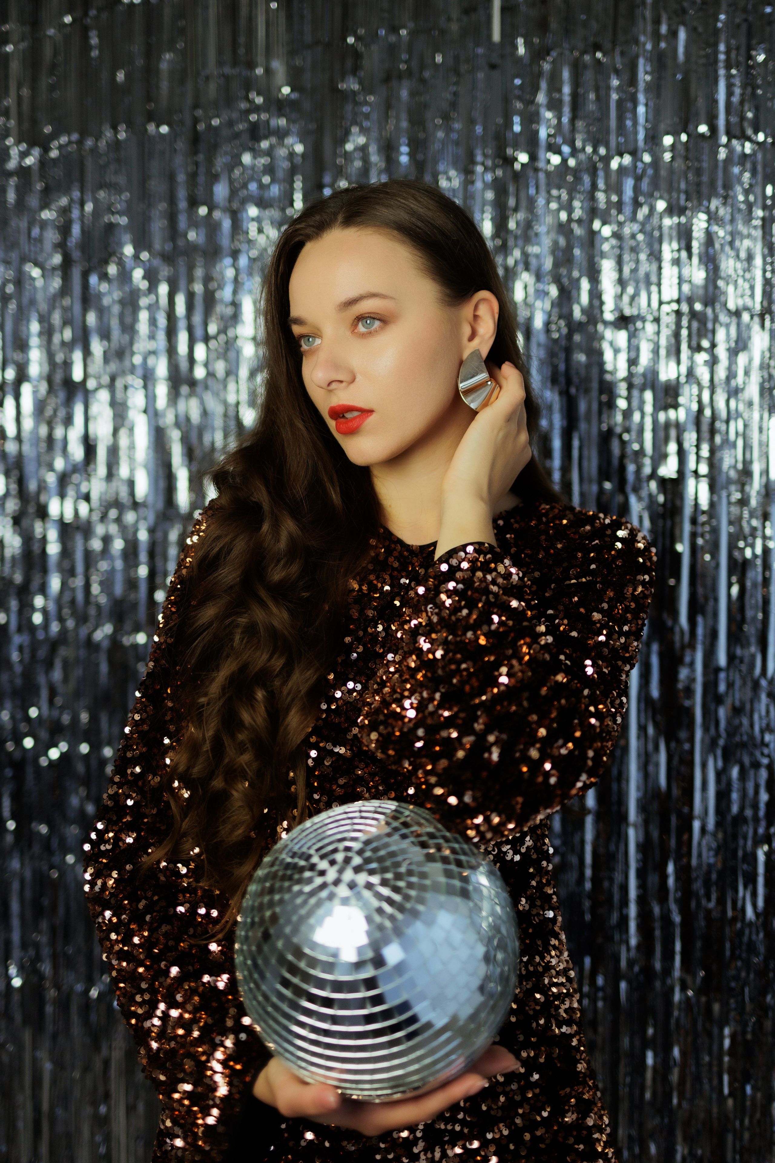 Glamorous Studio Photoshoot. Woman in Black Sequin Dress with Disco Ball. Kristina Kozheltsova- Soulful Portrait&Lifestyle&Love Story Photographer in Leipzig, Germany