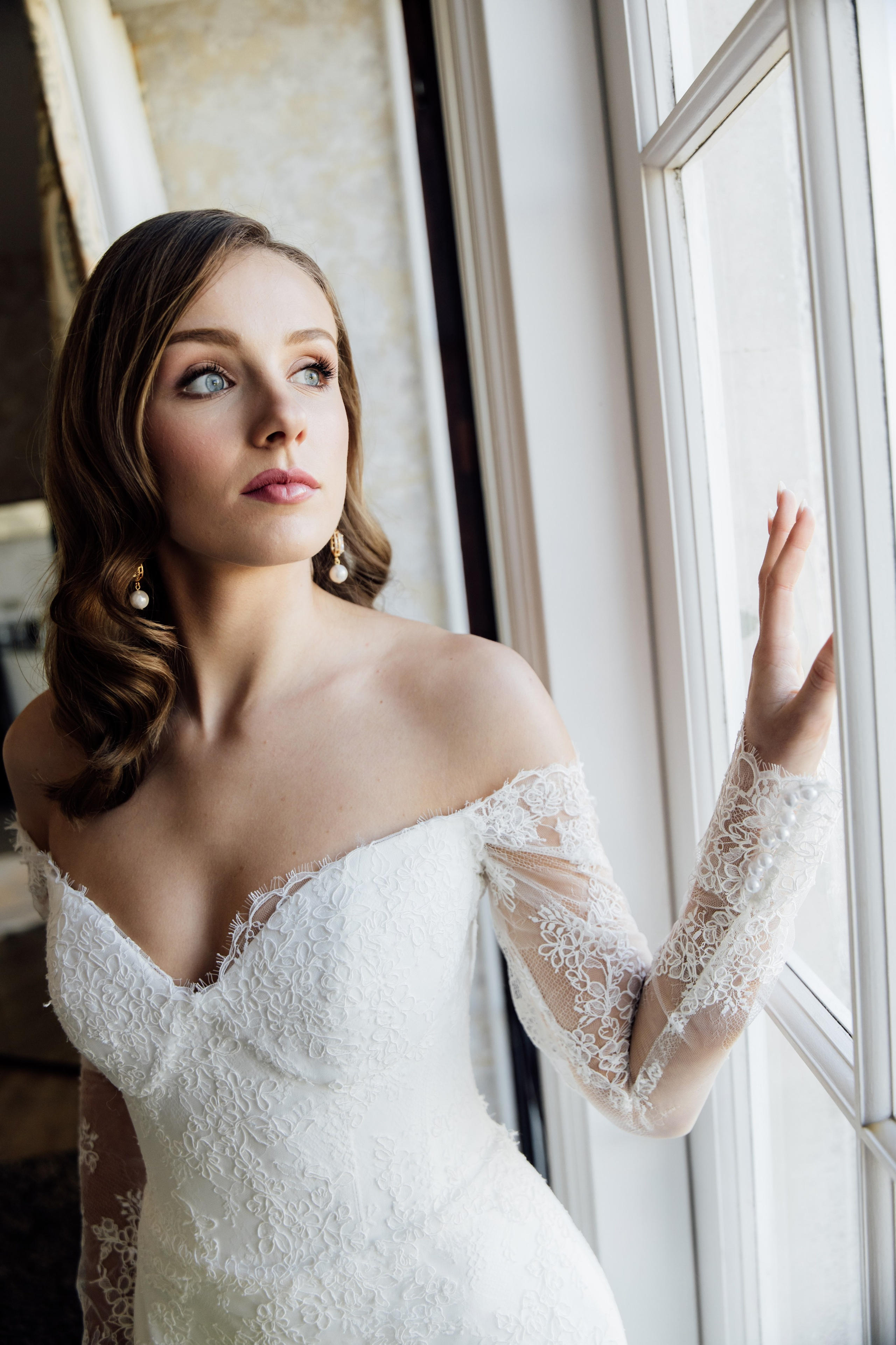 Elegant wedding portrait of bride and groom walking through the streets of ParisRomantic elopement moment captured in soft evening light in Paris, FranceLuxury wedding ceremony setup in a historic French venue with natural floralsCandid black and white photo of a couple at their city wedding in London, UKTimeless couple portrait in front of Marylebone Town Hall, LondonEditorial-style bridal preparation in a classic townhouse in the heart of LondonSoft light bridal portrait in a countryside château wedding in FranceFine art flat lay with French-inspired wedding details and vintage texturesCinematic golden hour photo at a UK estate wedding with historic architectureLuxury wedding tablescape with candles and florals at a London reception