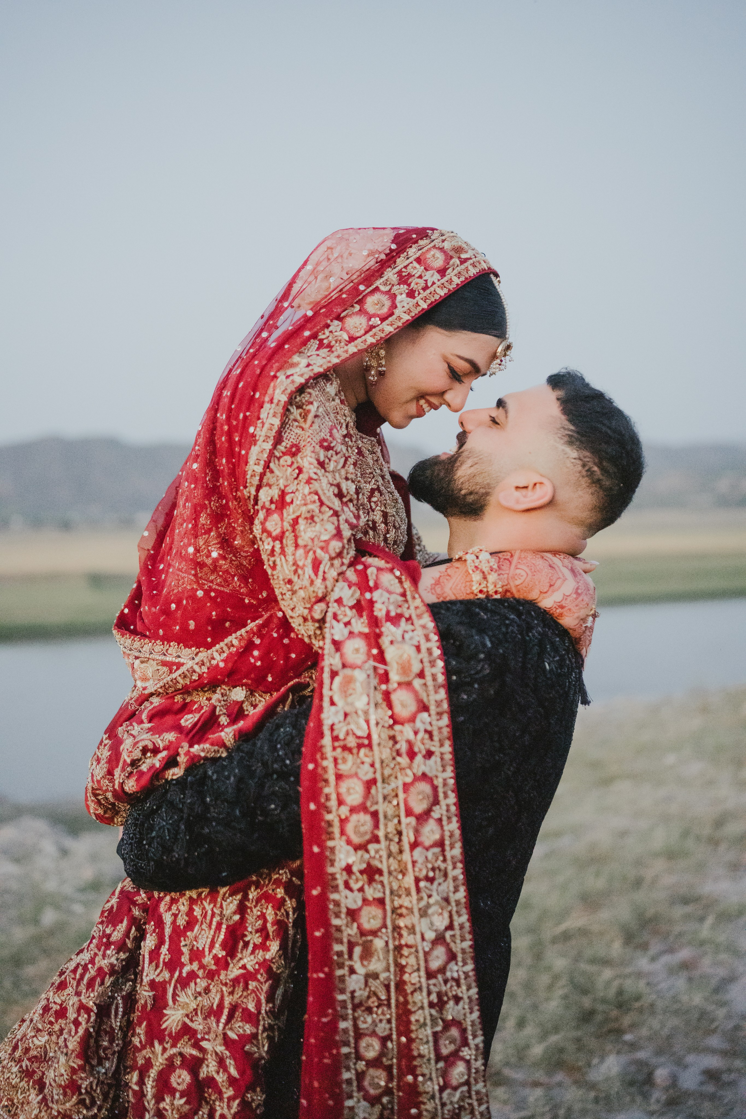Couple shoot in the fields during sunset 
