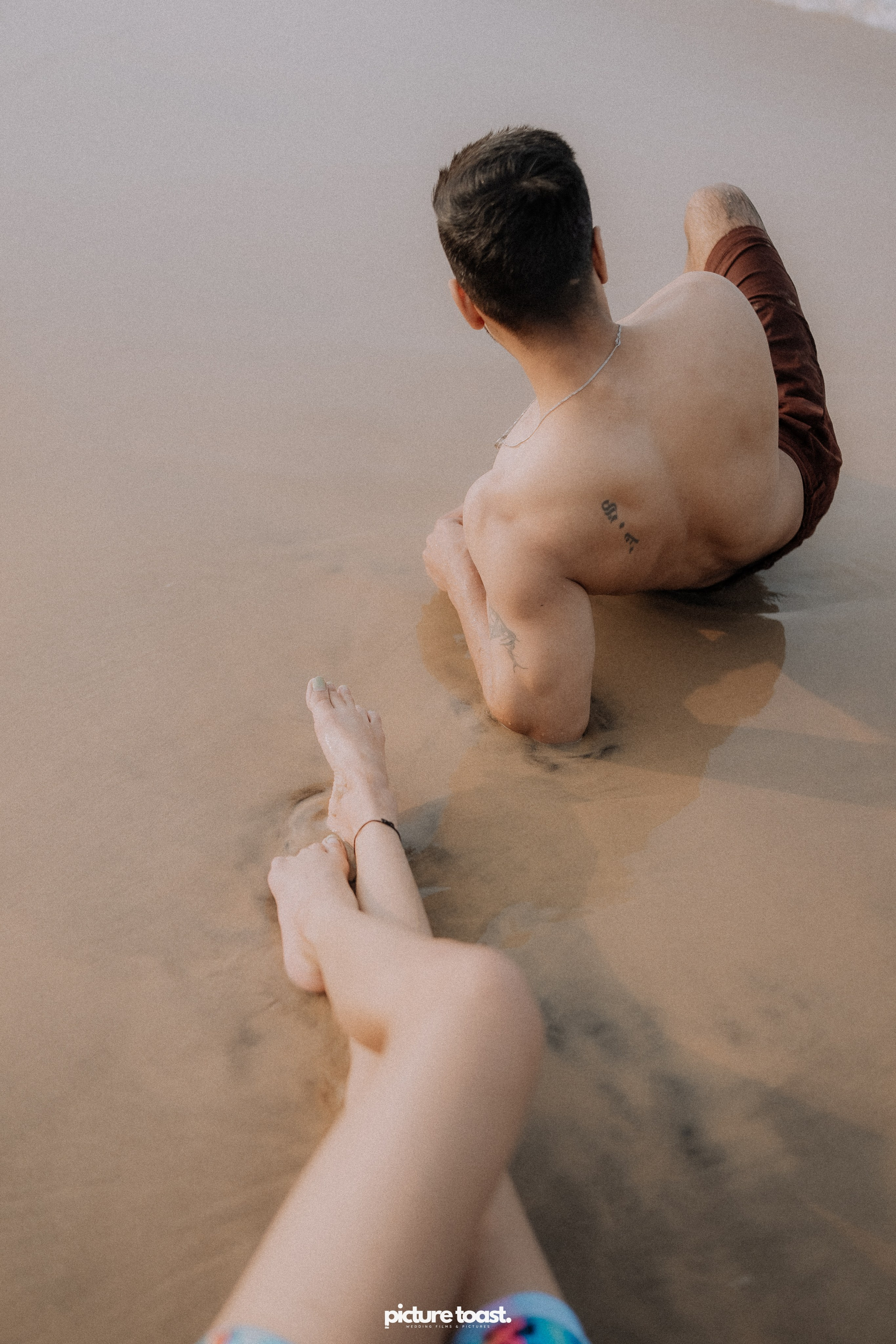 Love In The Beach. Fine art Wedding Photographers in India & Canada