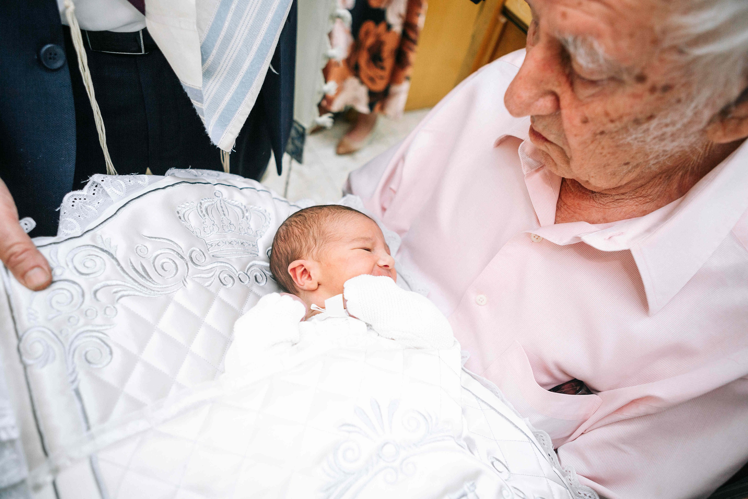 BRITH MILA IN THE SMALL SYNAGOGUE. PHOTOGRAPHER IN ISRAEL