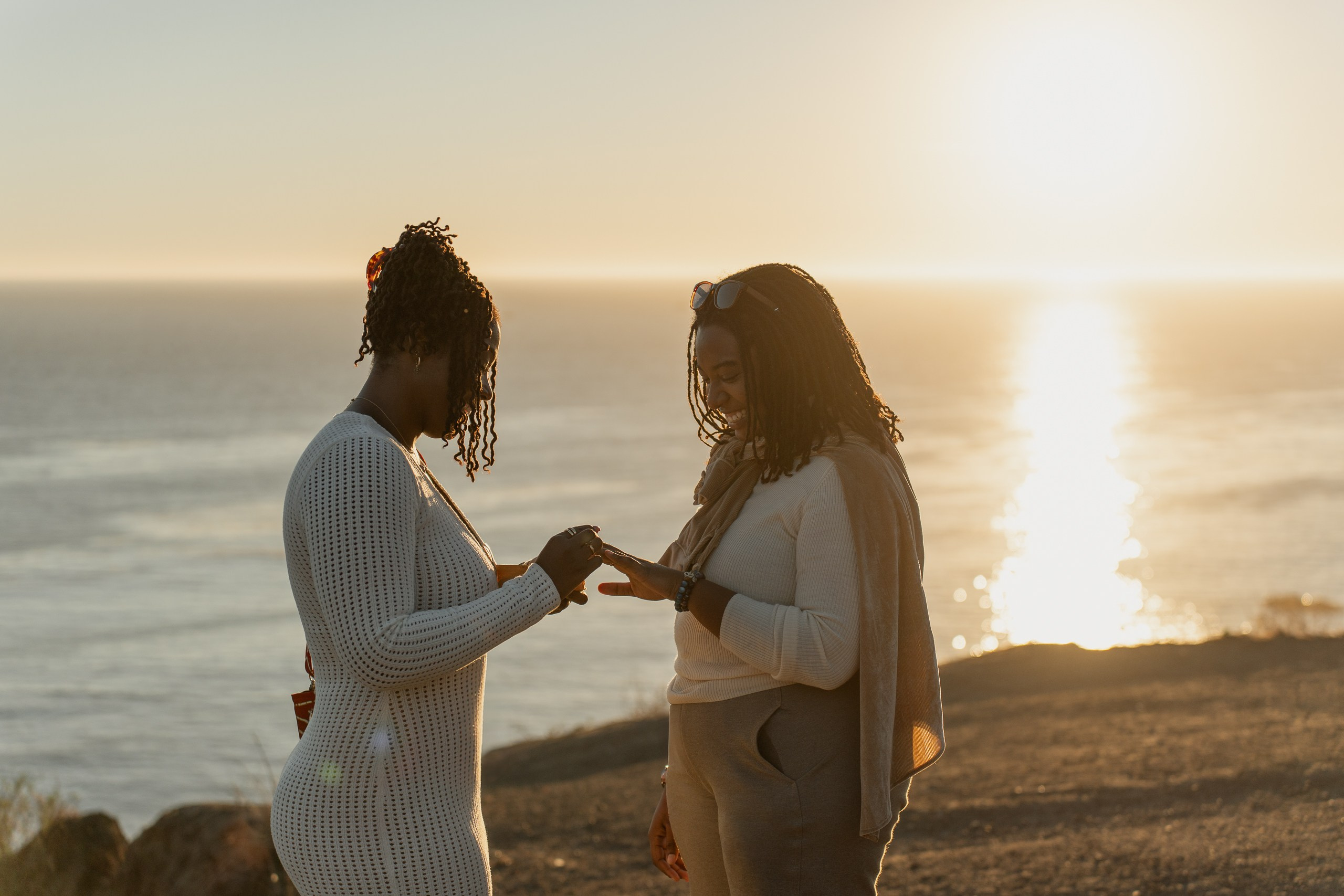 Golden hour engagement photo session with an ocean view