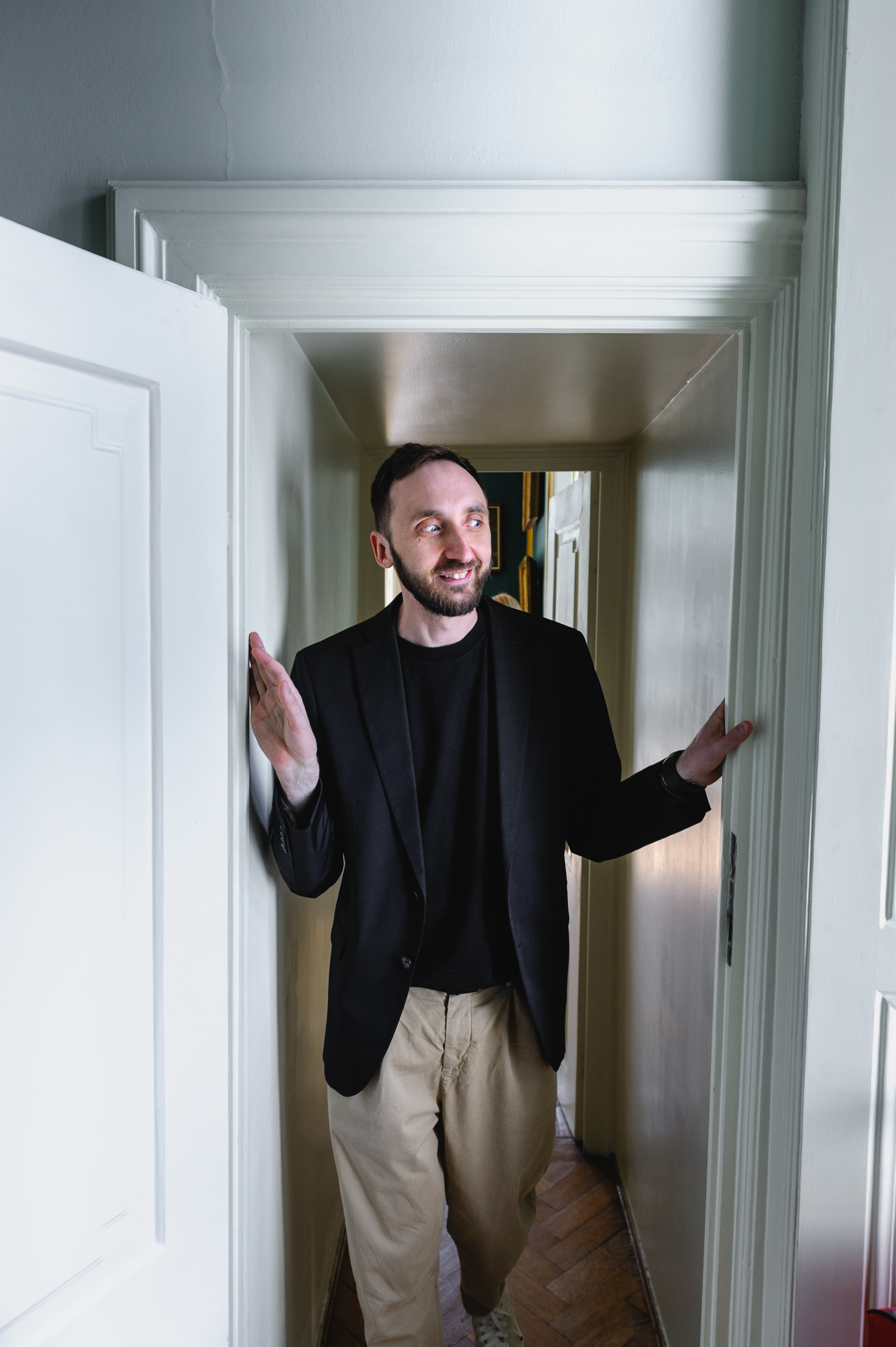 Cultural scholar Dmitry Solodkiy in a doorway passage. The Royal Baths Museum in Warsaw.