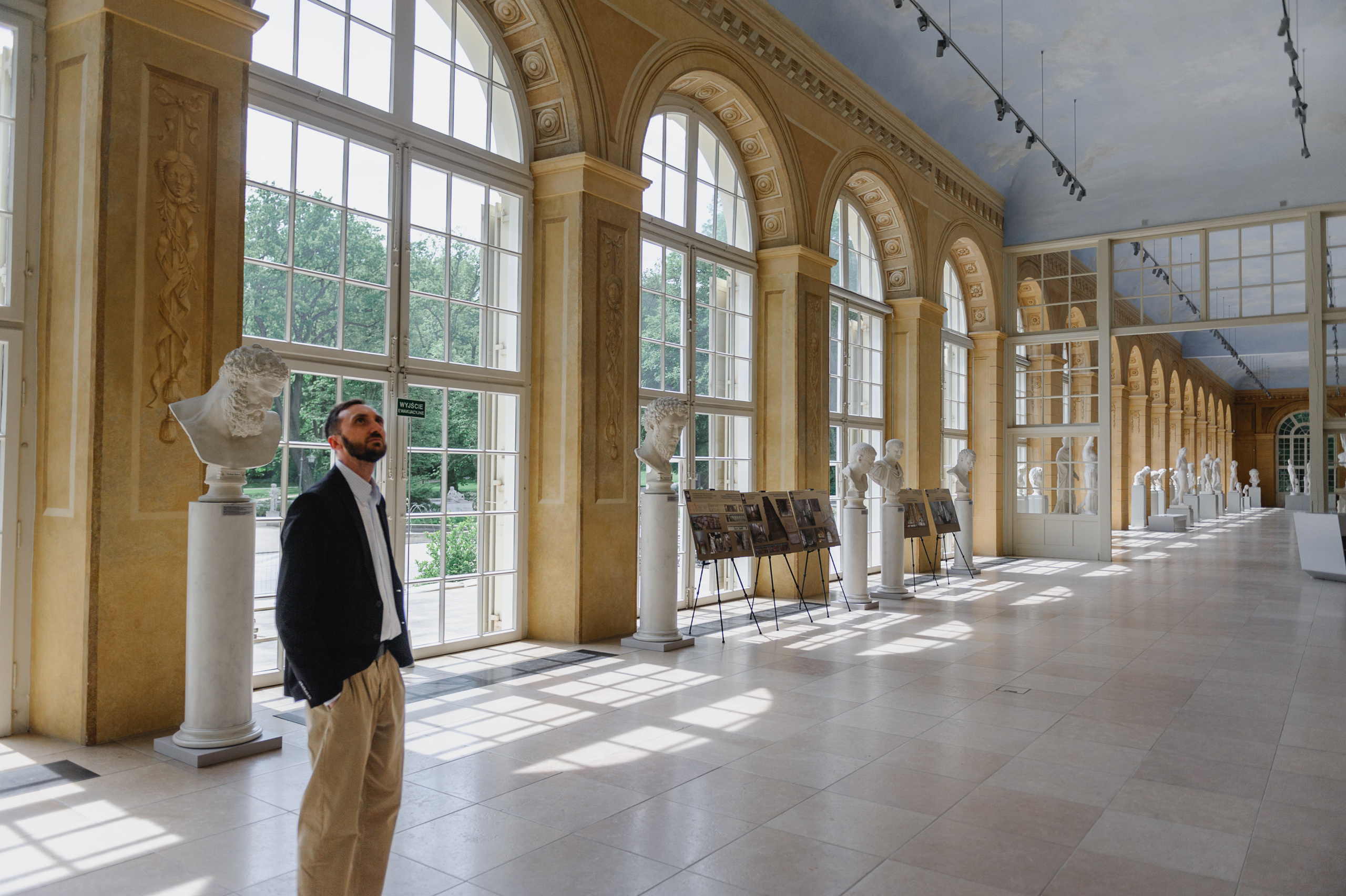 Art historian Dmitry Solodkiy in the sculpture hall. The Royal Baths Museum in Warsaw.
