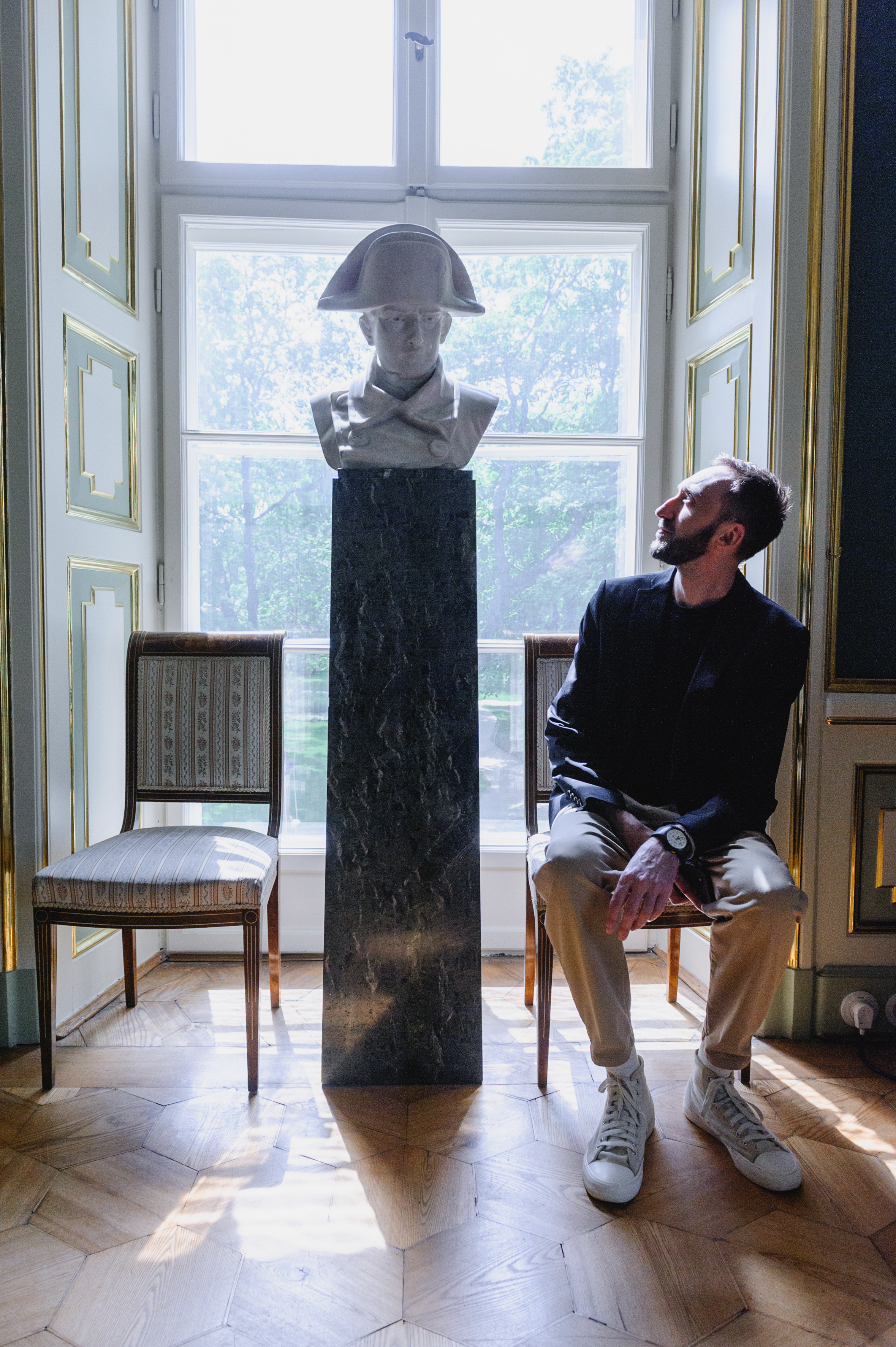 Cultural scholar Dmitry Solodkiy near the statue of Napoleon. The Royal Baths Museum in Warsaw.