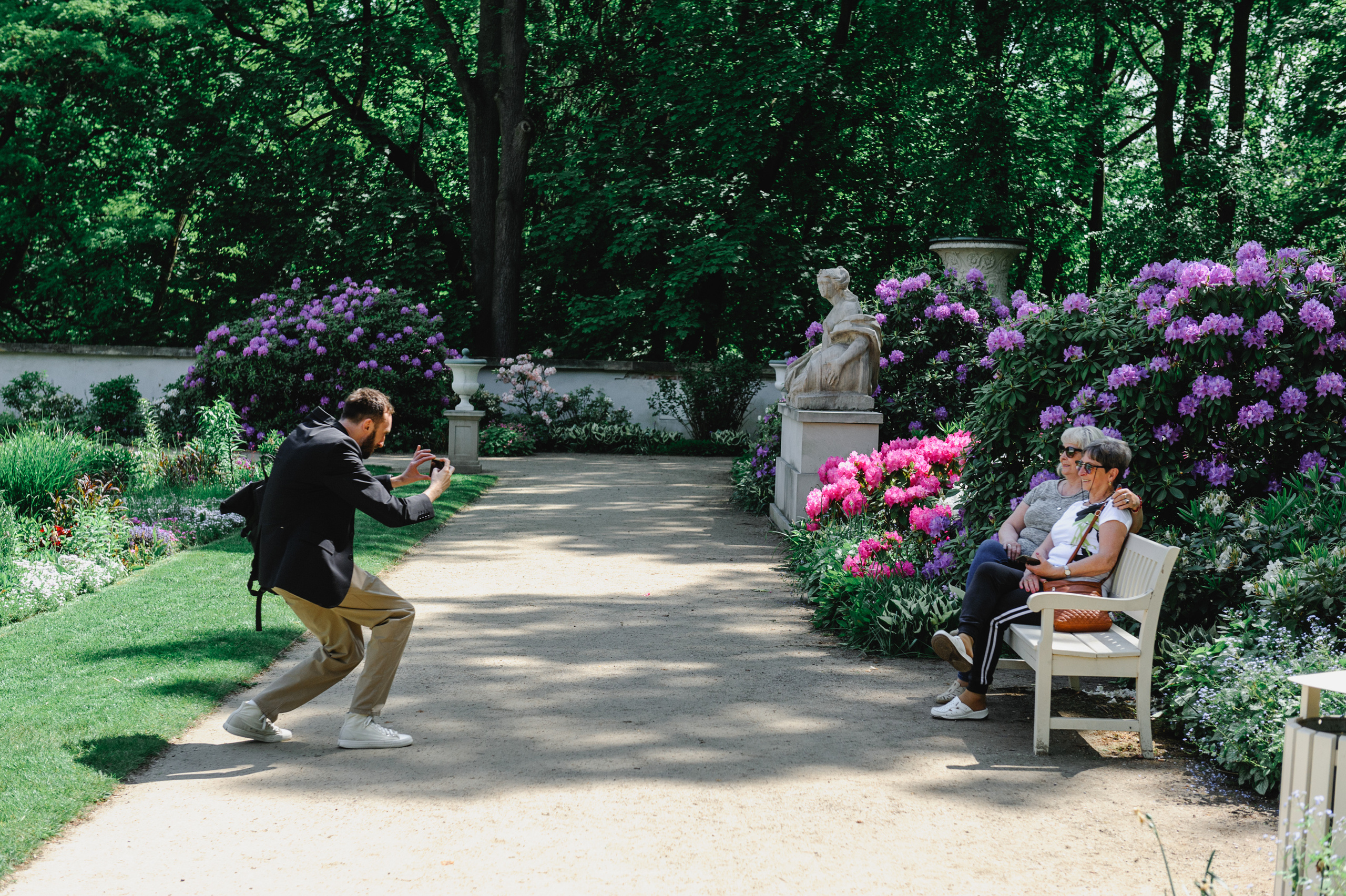 Art historian Dmitry Solodkiy photographs charming ladies in Lazienki Park in Warsaw.