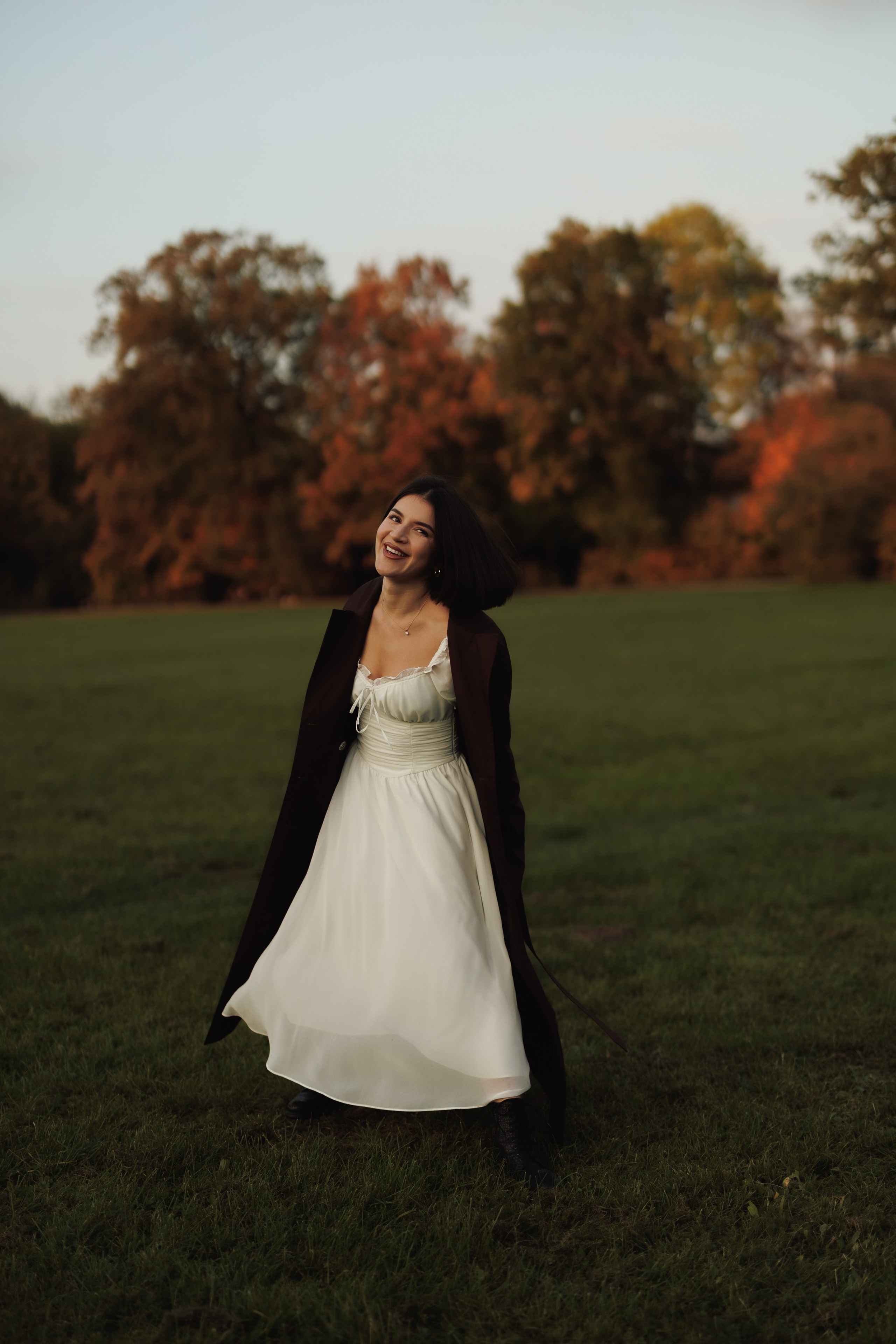 Autumn Park Photoshoot | Woman in White Dress. Cinematic&Elegant Portraits by Kristina Kozheltsova. Kristina Kozheltsova- Soulful Portrait&Lifestyle&Love Story Photographer in Leipzig, Germany