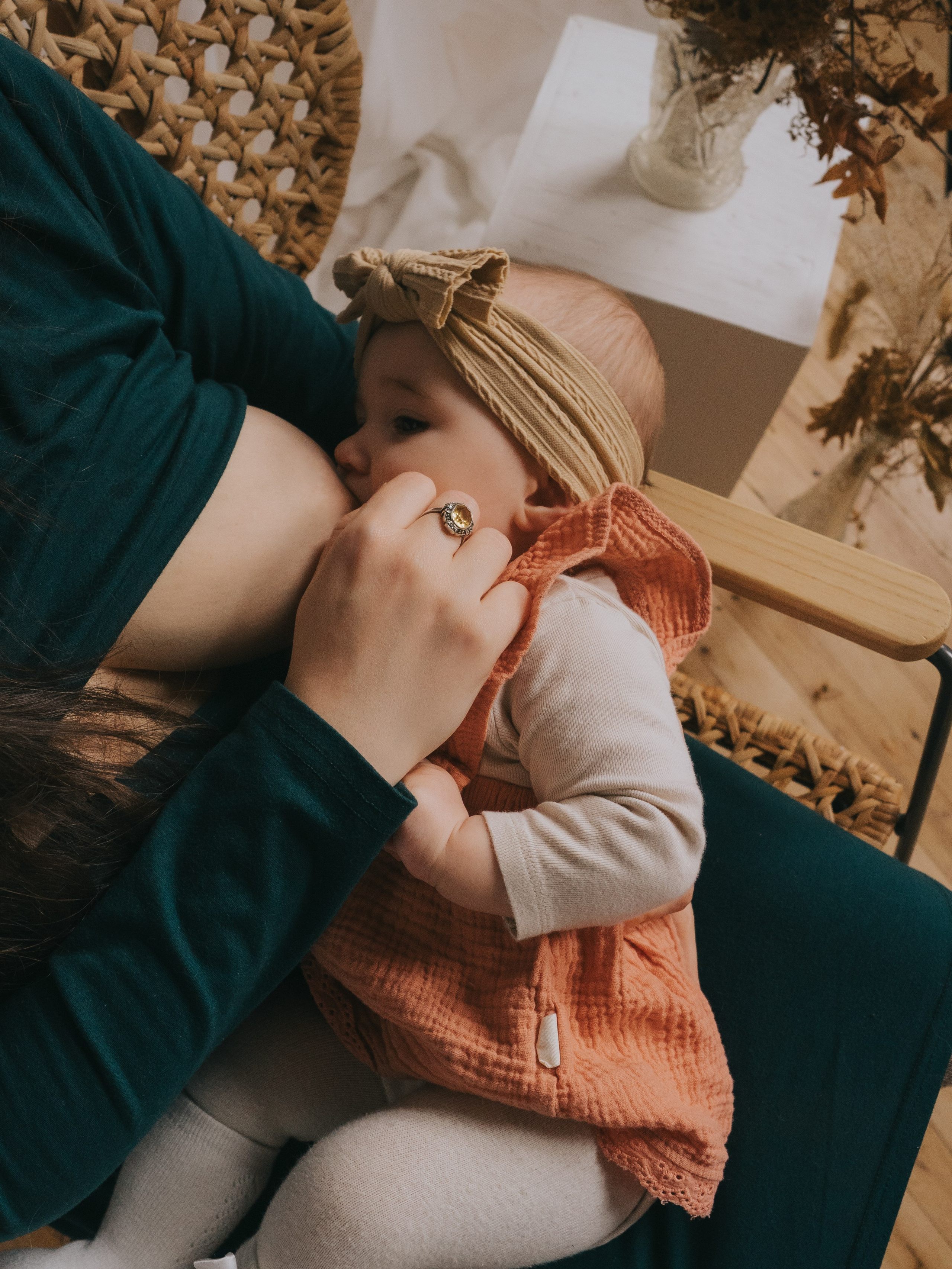 Baby being breastfed during a breastfeeding session.