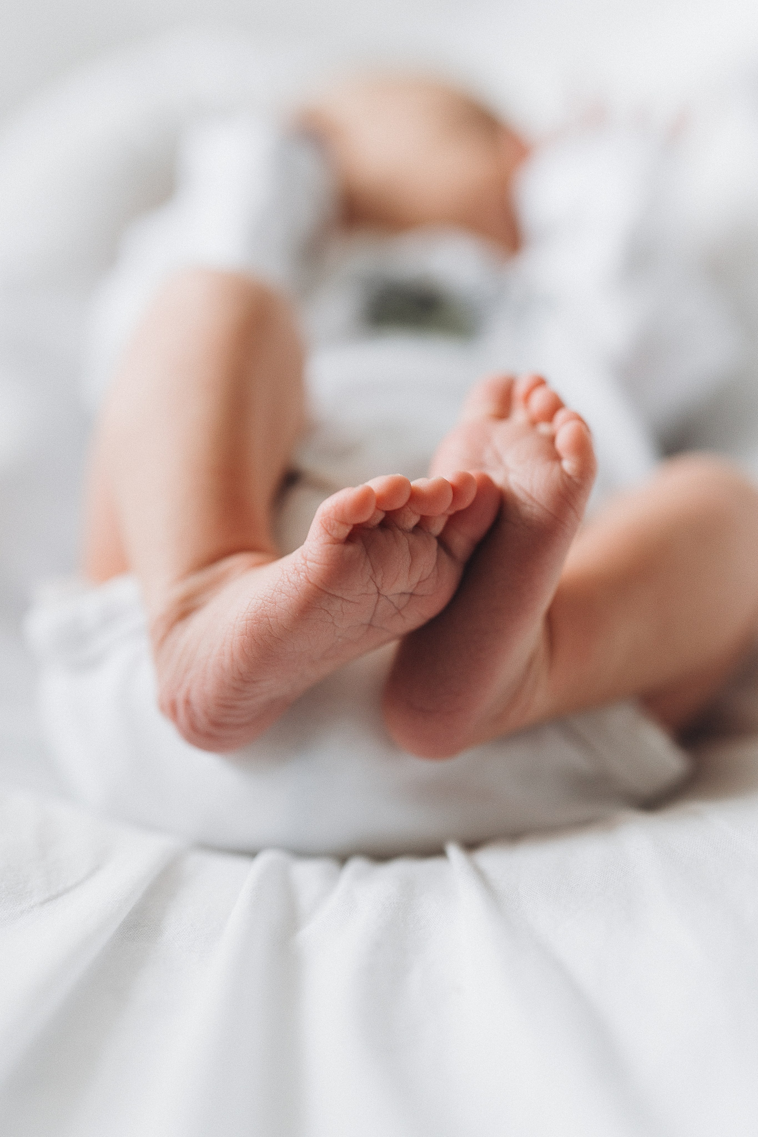 Baby girl home shooting. Family, conceptual women portrait photograher in Geneva, Switzerland