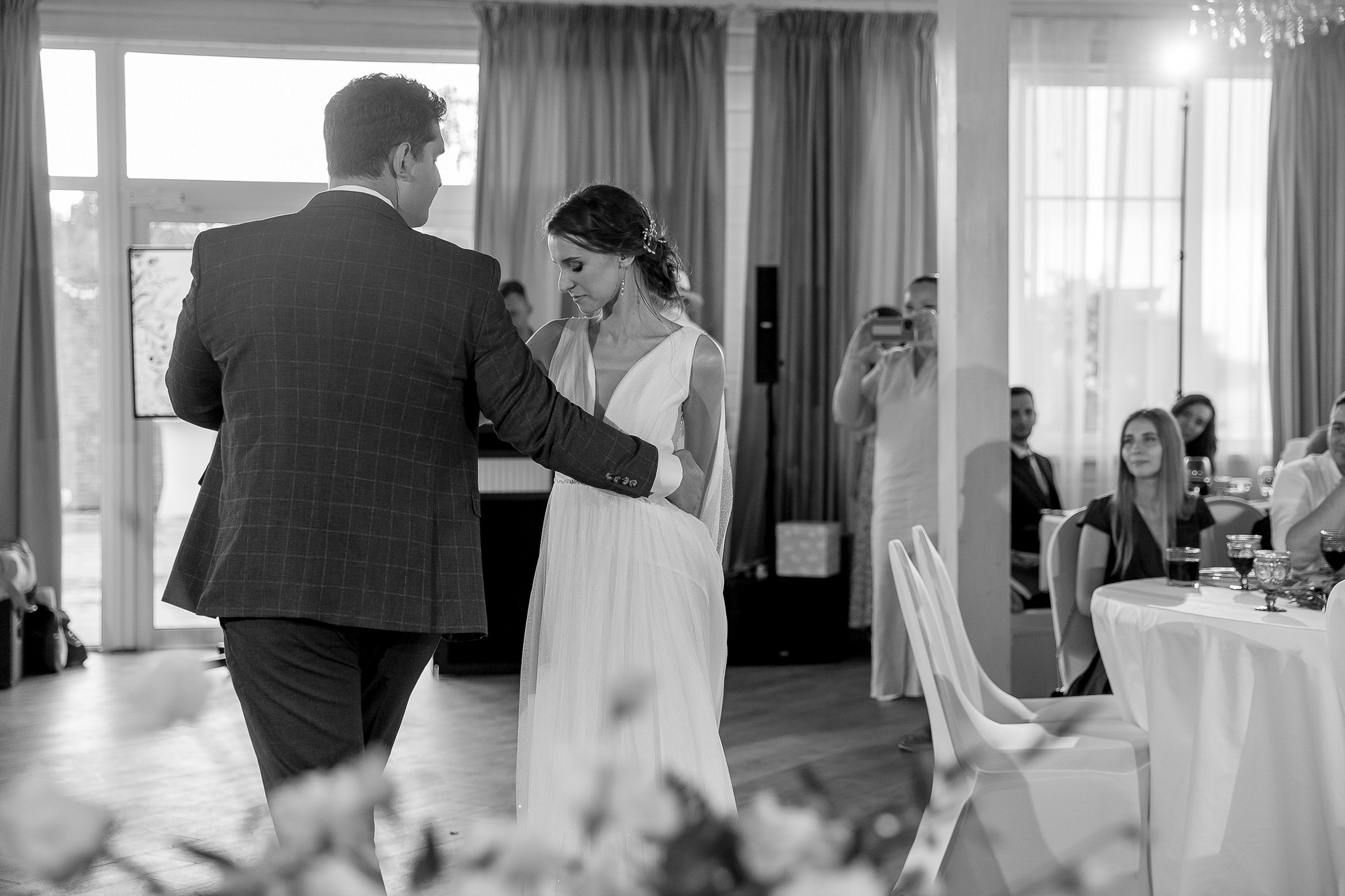 Couple dancing by riverside, by Tanya Bodgan, Falmouth wedding photographer.