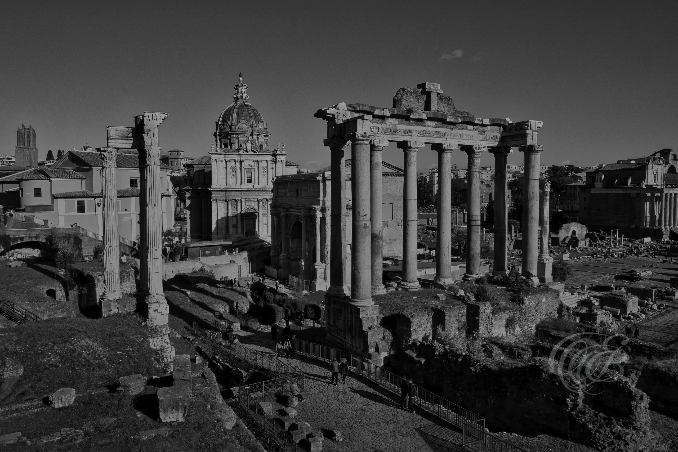 Rome, Italy – Roman Forum at sunset in black and white fine art photography, showing ancient Roman ruins, columns, and temples in evening light – Eduardo Bartoli Photography.