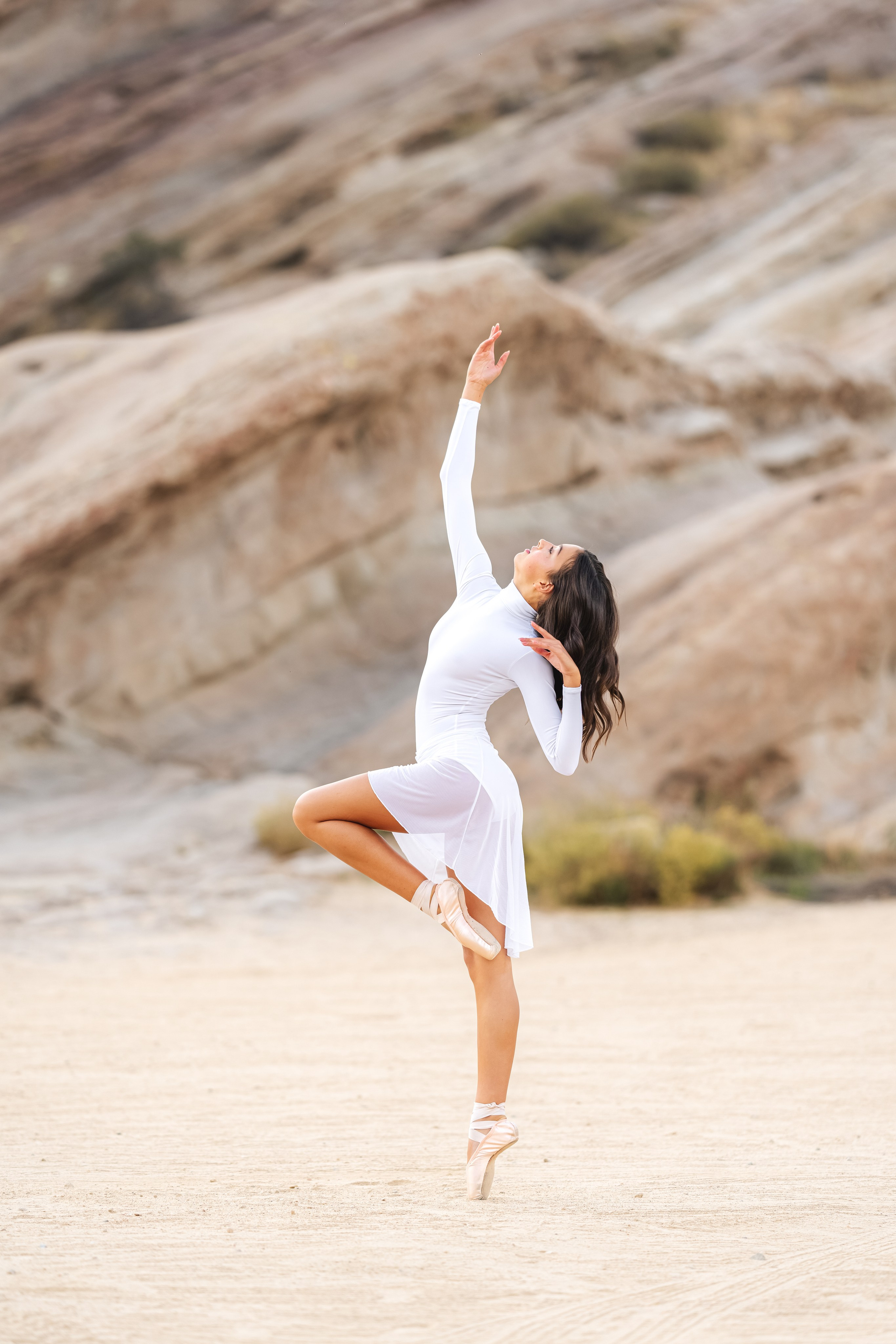 Ballerina in flowing motion captured by professional dance photographer