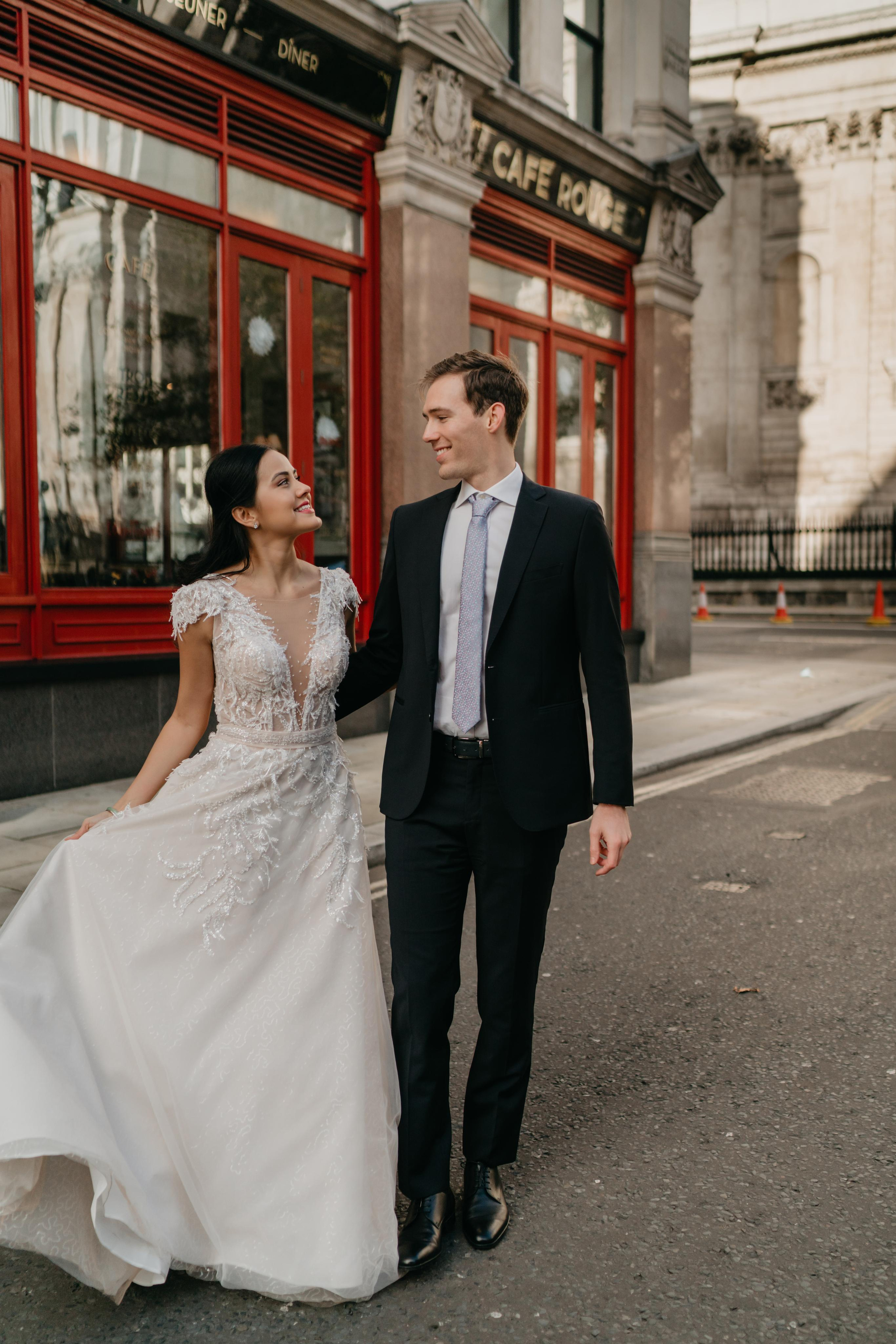 Wedding session by Tower Bridge and St Pauls Cathedral. London portrait and family photographer