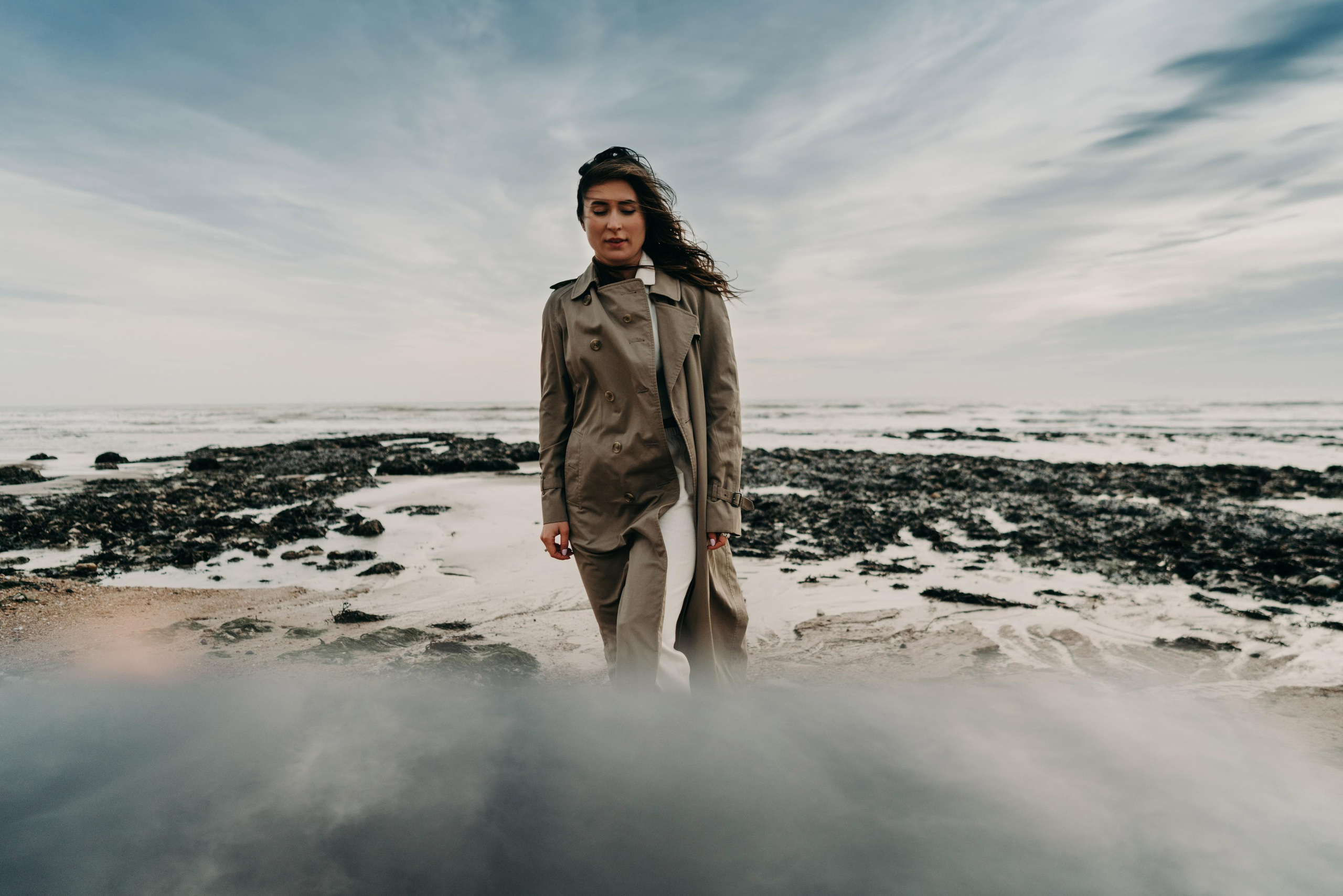 young women walking on the beach 