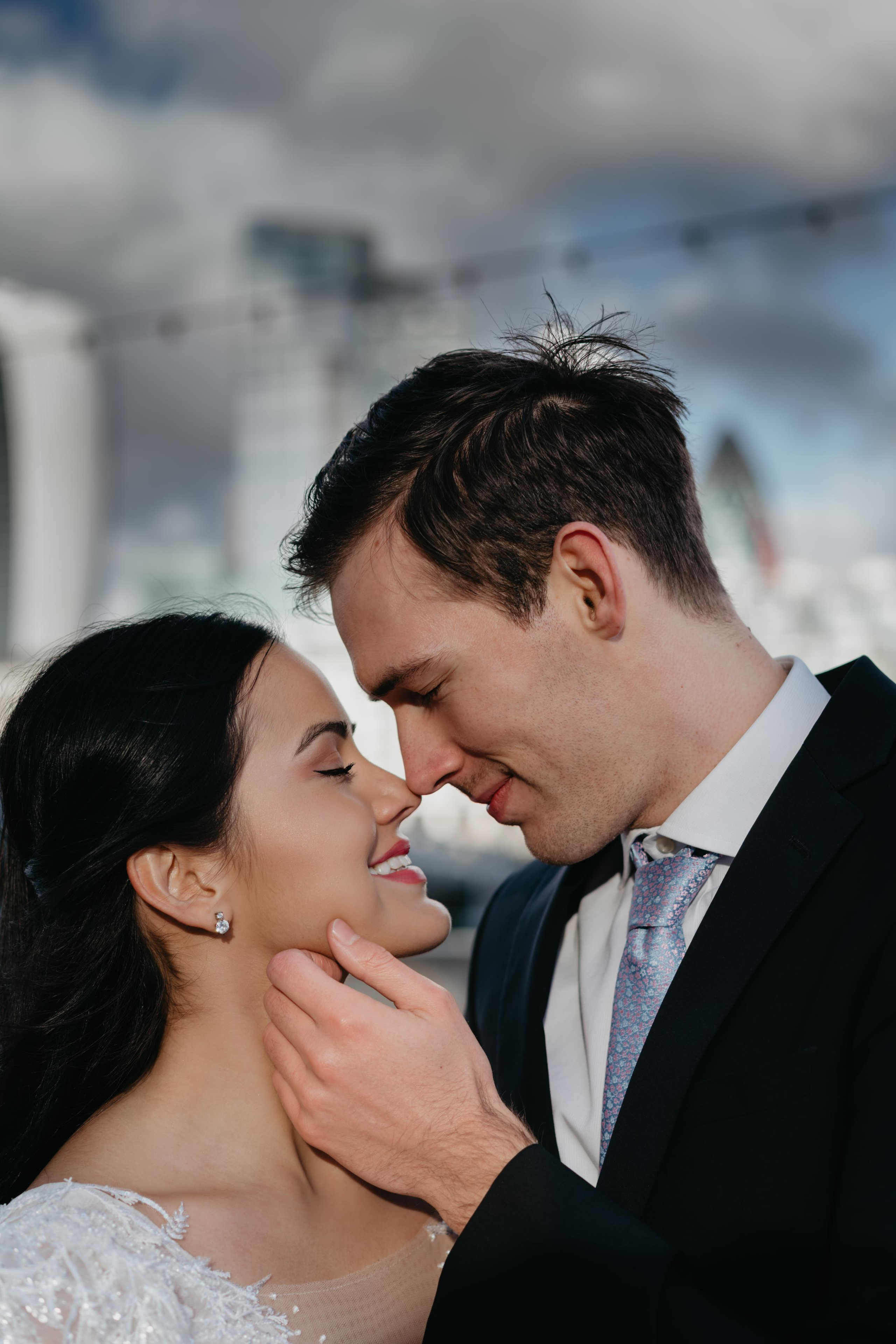 Wedding session by Tower Bridge and St Pauls Cathedral. London portrait and family photographer