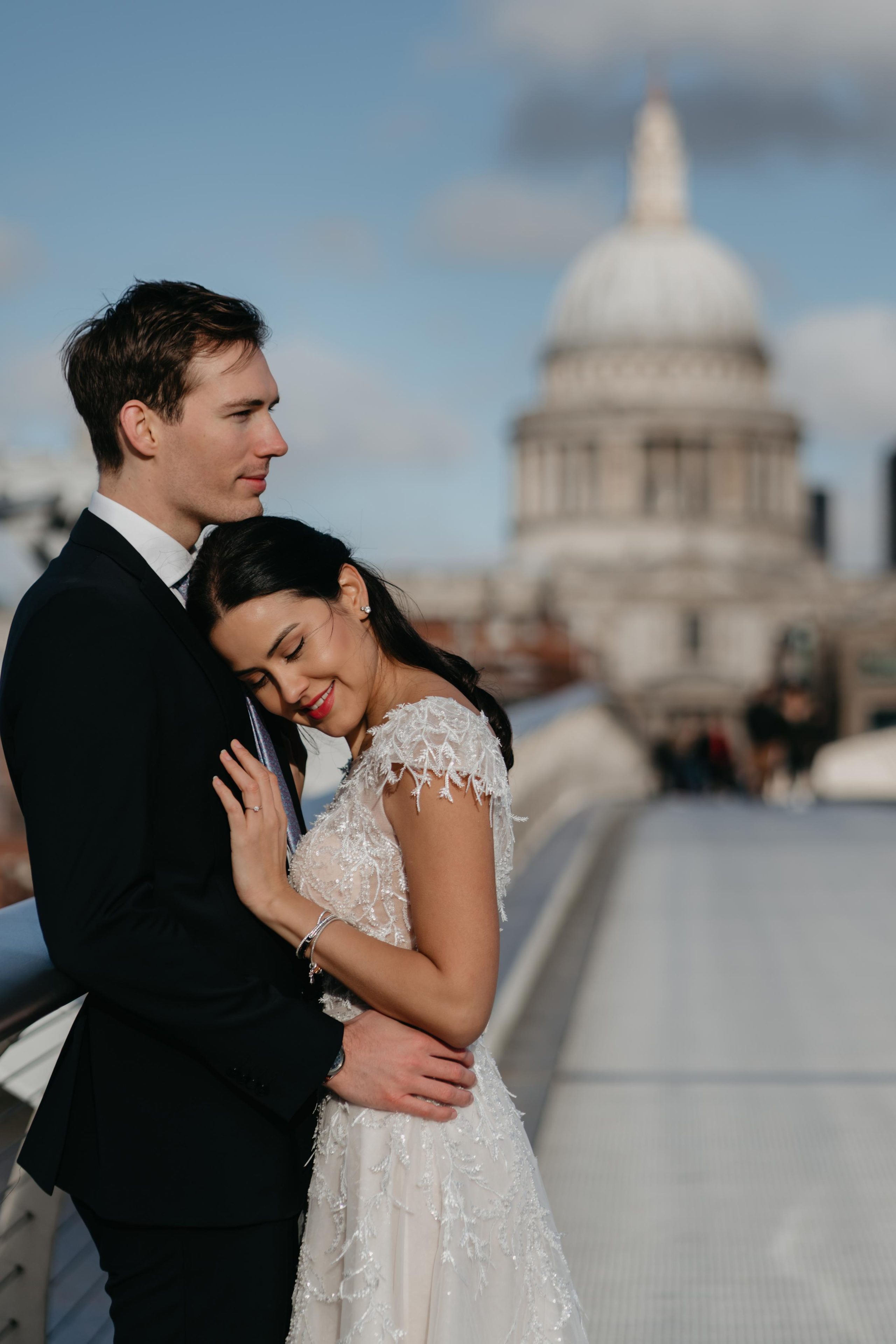 Wedding session by Tower Bridge and St Pauls Cathedral. London portrait and family photographer