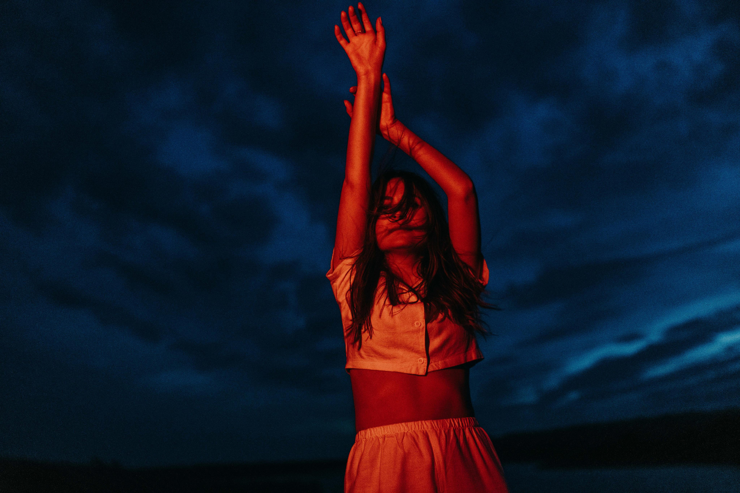young women photo with red lights 