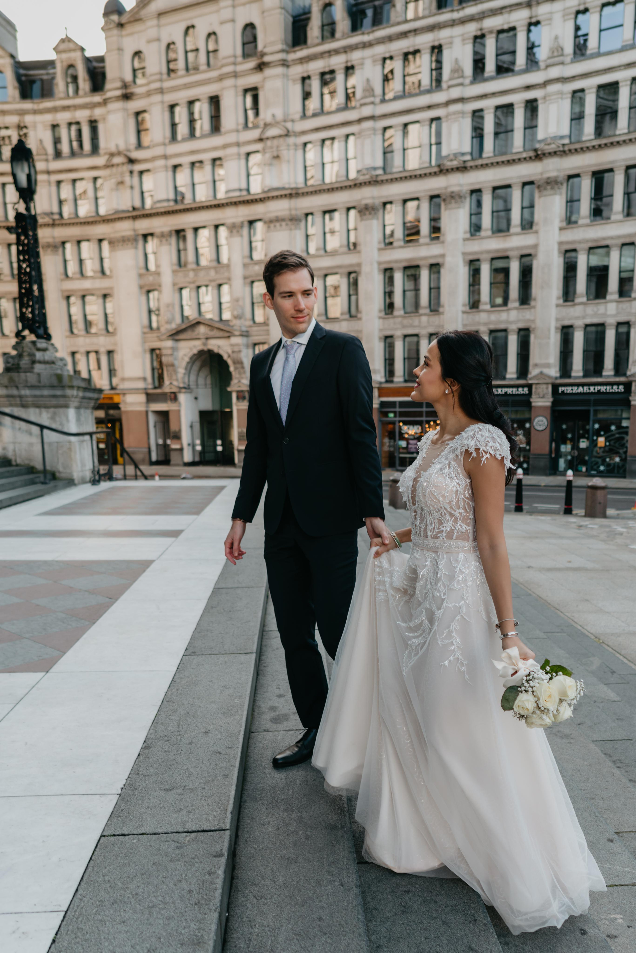 Wedding session by Tower Bridge and St Pauls Cathedral. London portrait and family photographer