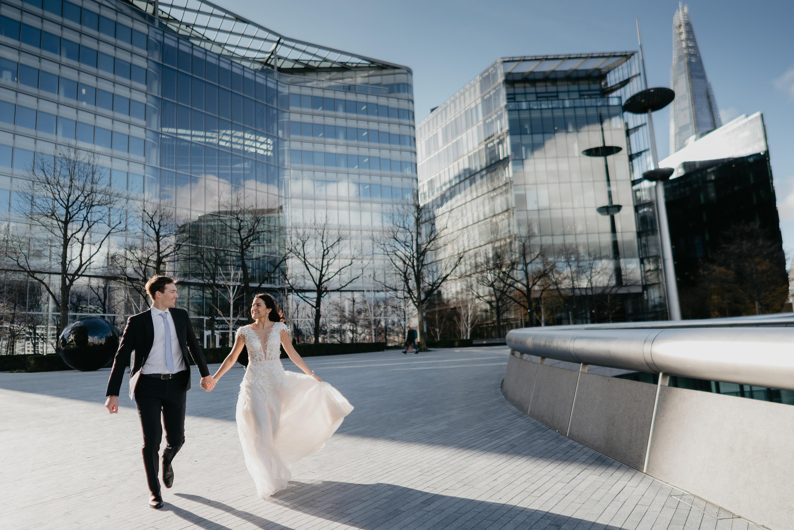 Wedding session by Tower Bridge and St Pauls Cathedral. London portrait and family photographer