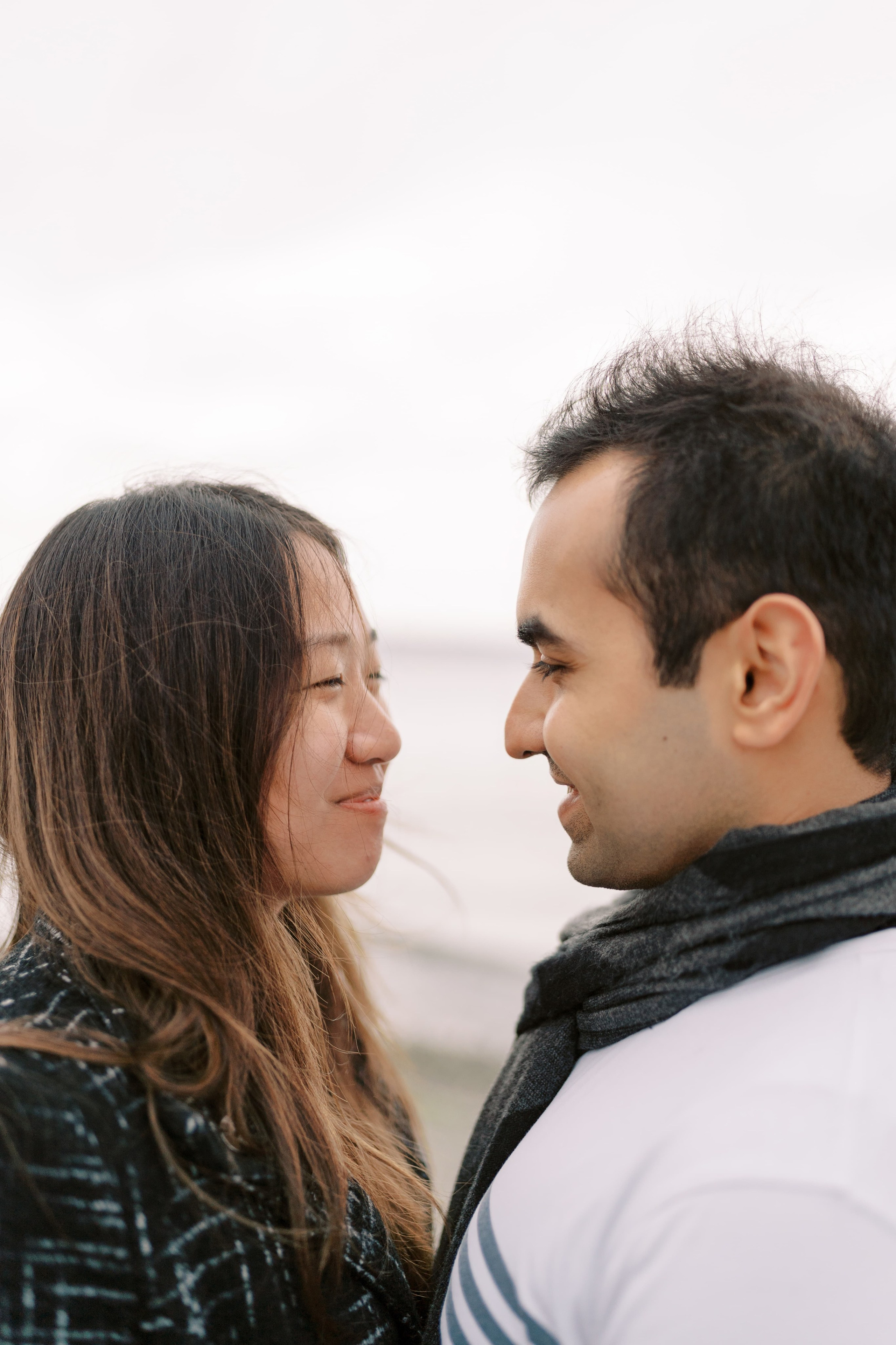 Proposal. December 2024. Alki Point Lighthouse, Washington state. EVAN ARISTOV WEDDING PHOTOGRAPHY — Seattle Wedding Photographer