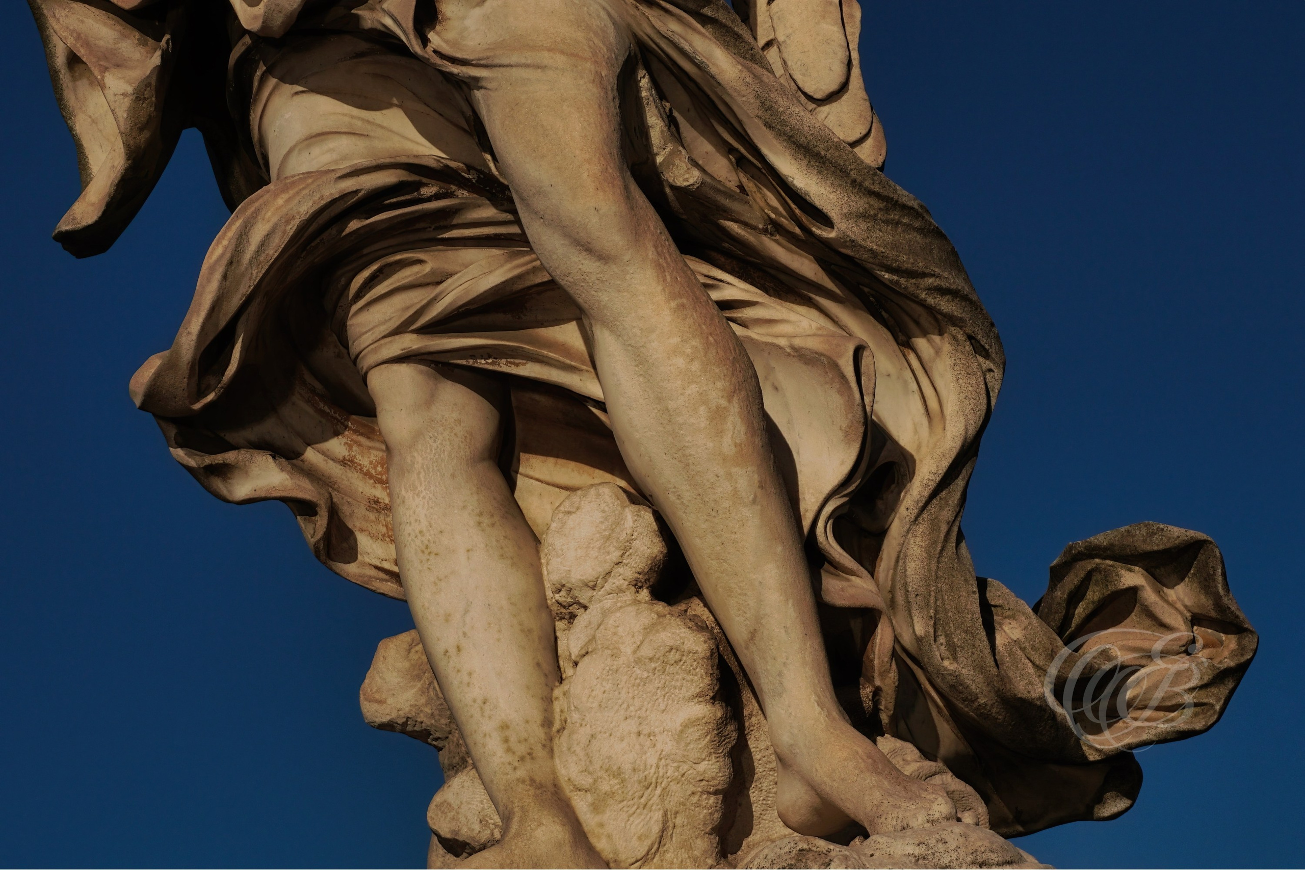 Rome Italy — Travertine angel feet on Ponte Sant’Angelo — Eduardo Bartoli Fine Art Photography — Fine art close-up of travertine feet from angel statue on Ponte Sant’Angelo in Rome, Italy — photography by Eduardo Bartoli.