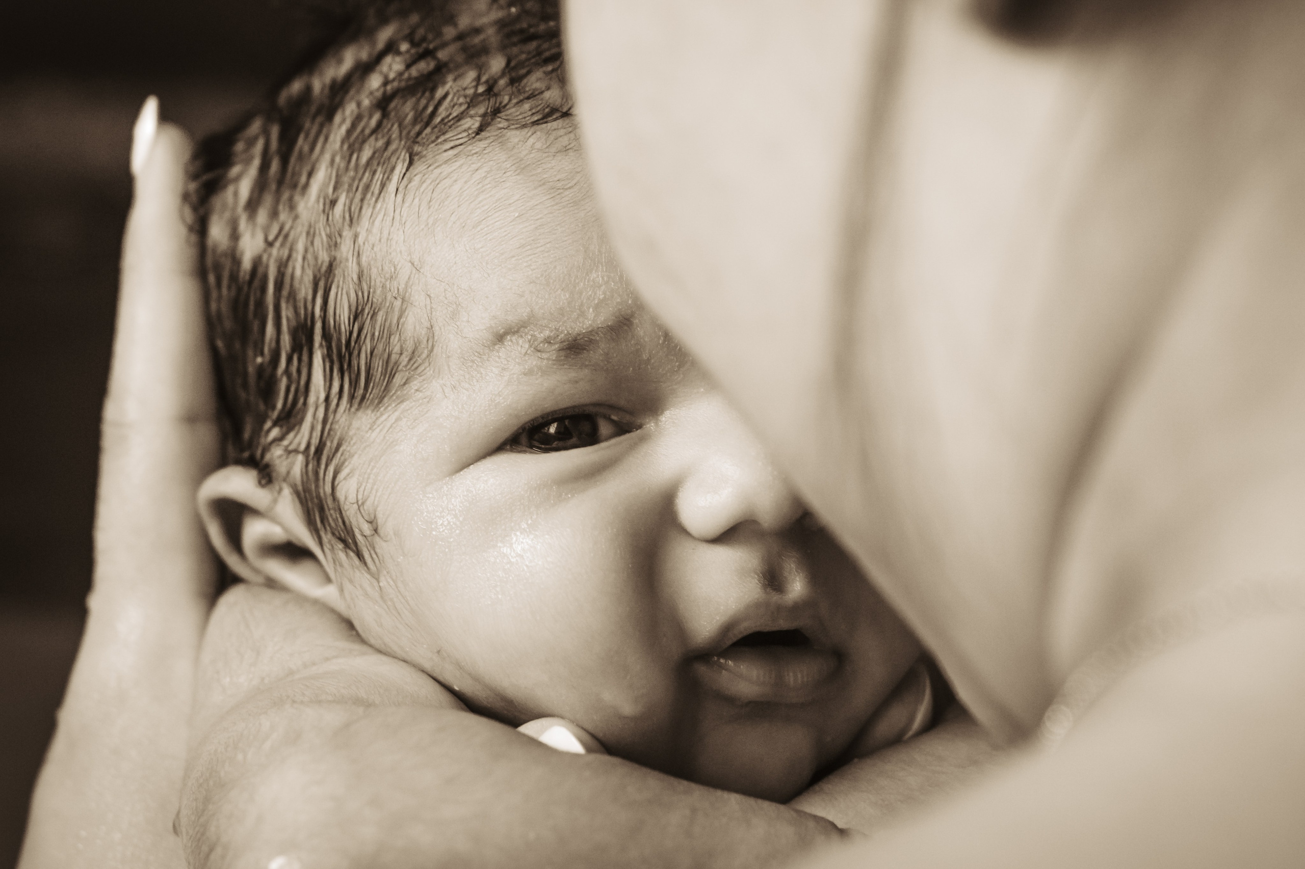 Monika, Pool newborn shooting. Family photographer Aargau Zurich