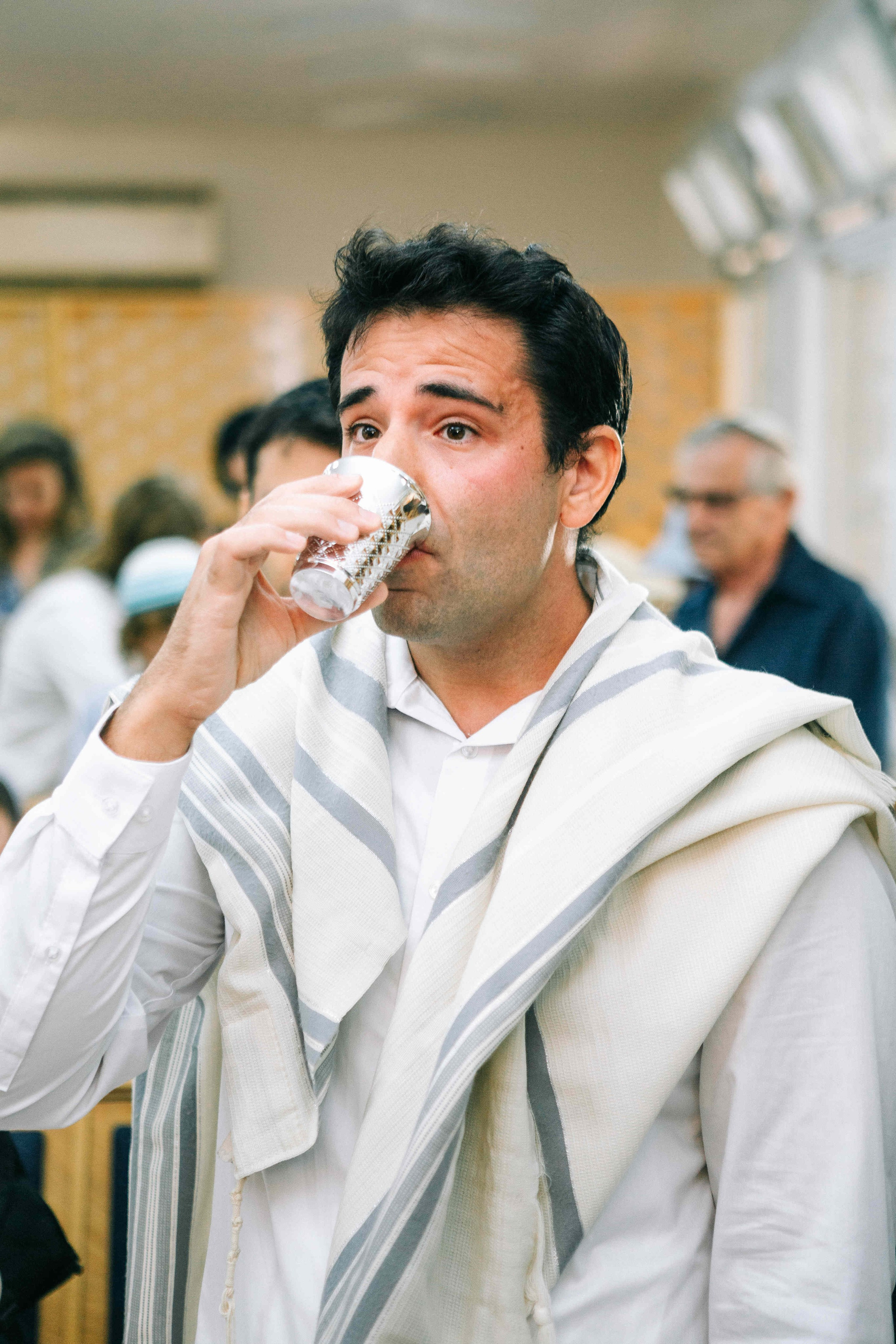 BRITH MILA IN THE SMALL SYNAGOGUE. PHOTOGRAPHER IN ISRAEL