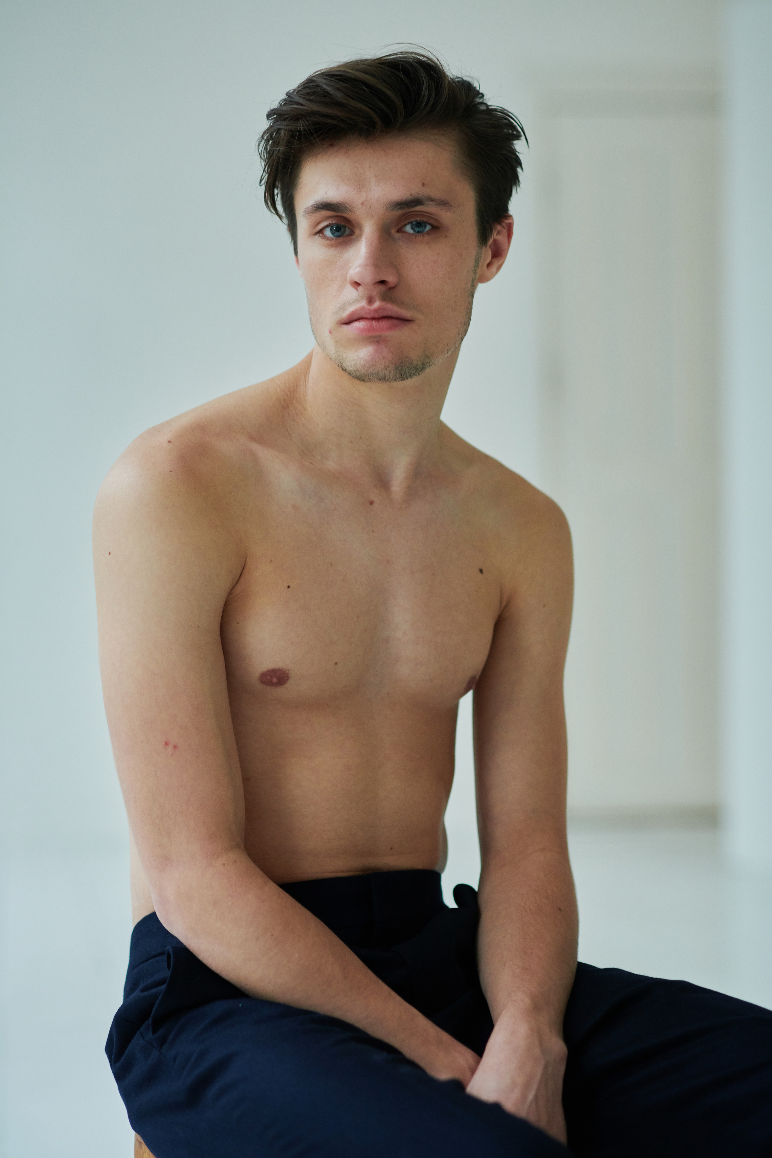 An engaging portrait of a young actor in a studio in Amsterdam