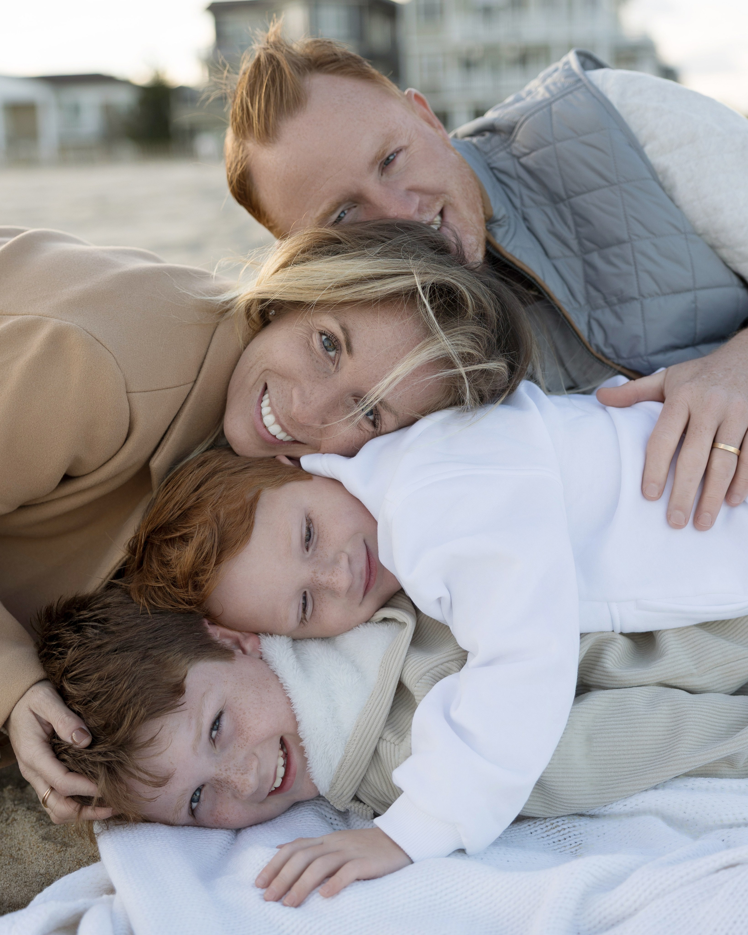 Sun, Sand, and Family Hugs. Family, lifestyle, and commercial photography in New York and New Jersey