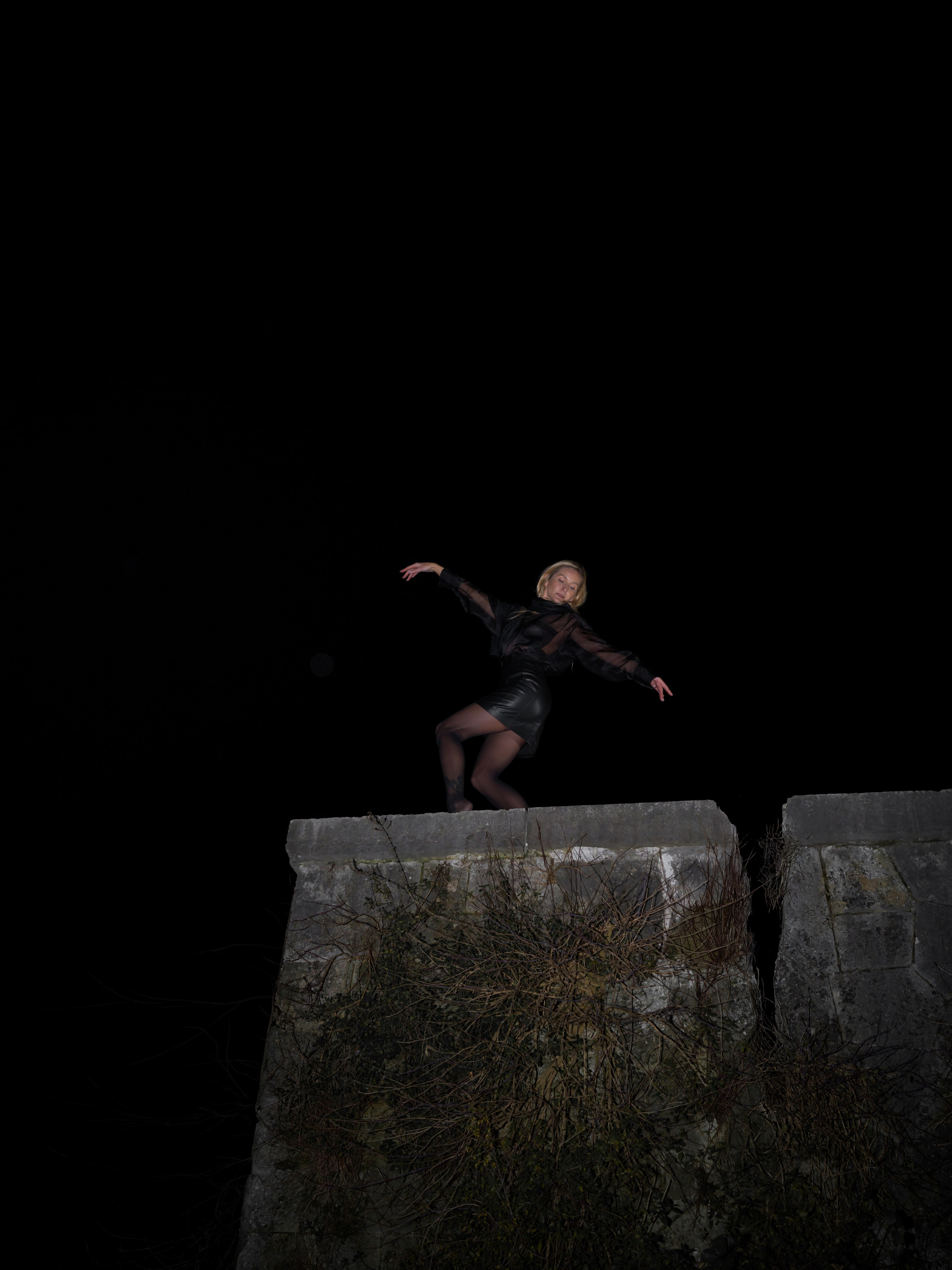 Artistic model photoshoot in Italy with warm tones and soft light.