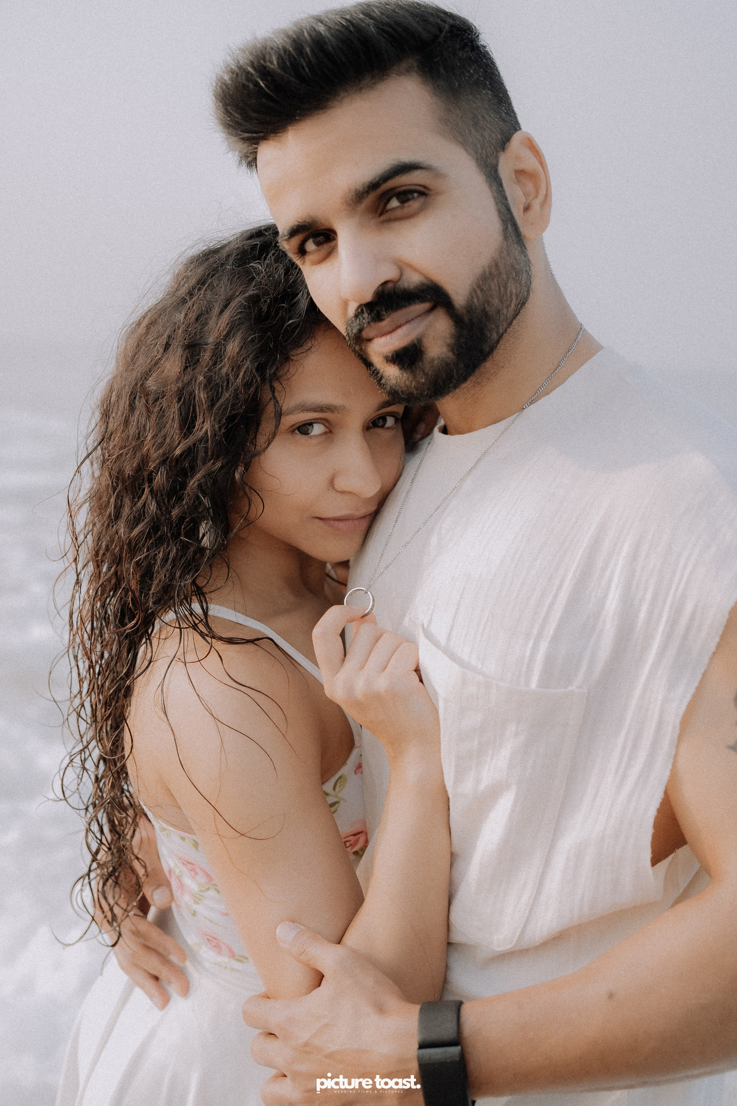 Love In The Beach. Fine art Wedding Photographers in India & Canada