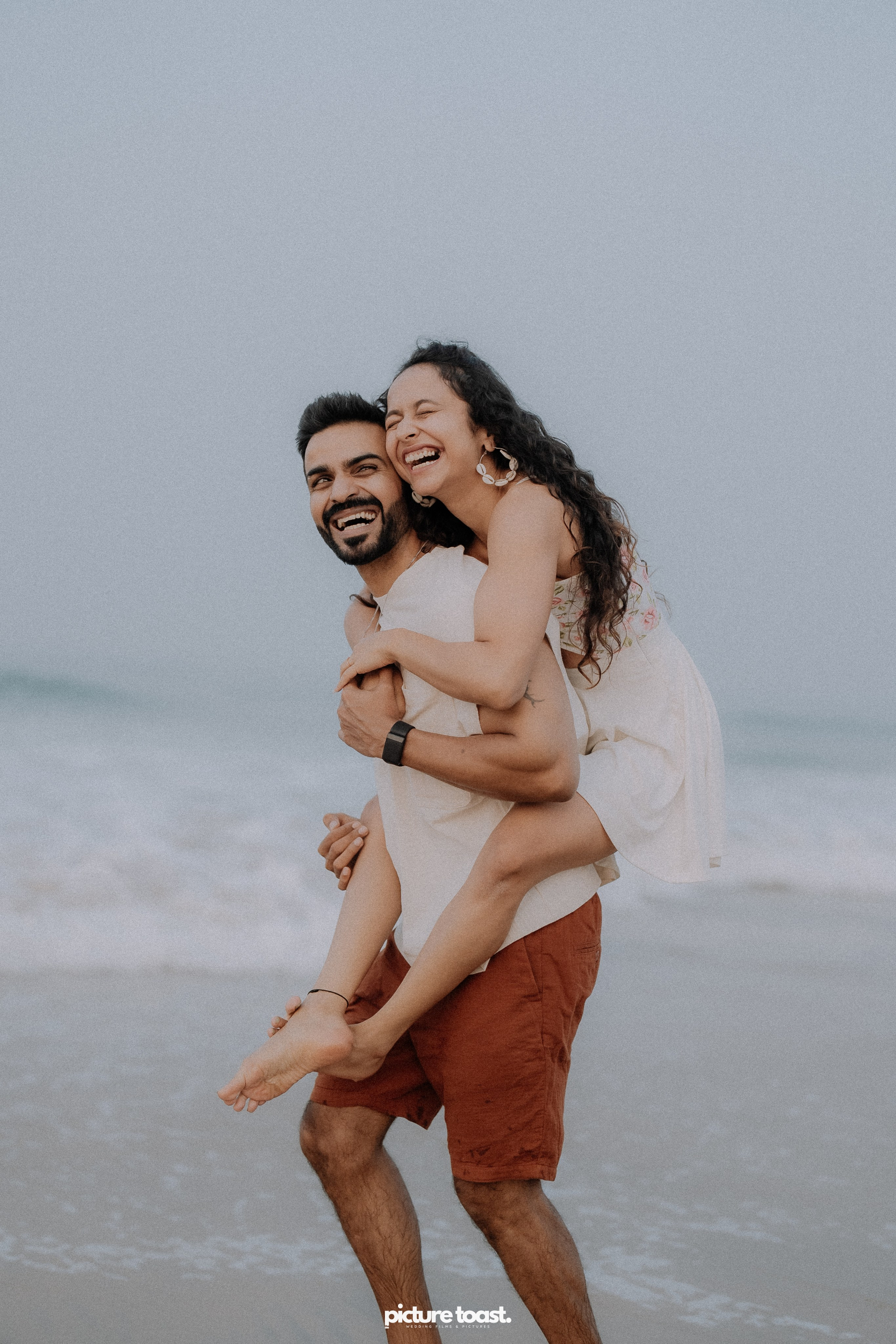 Love In The Beach. Fine art Wedding Photographers in India & Canada
