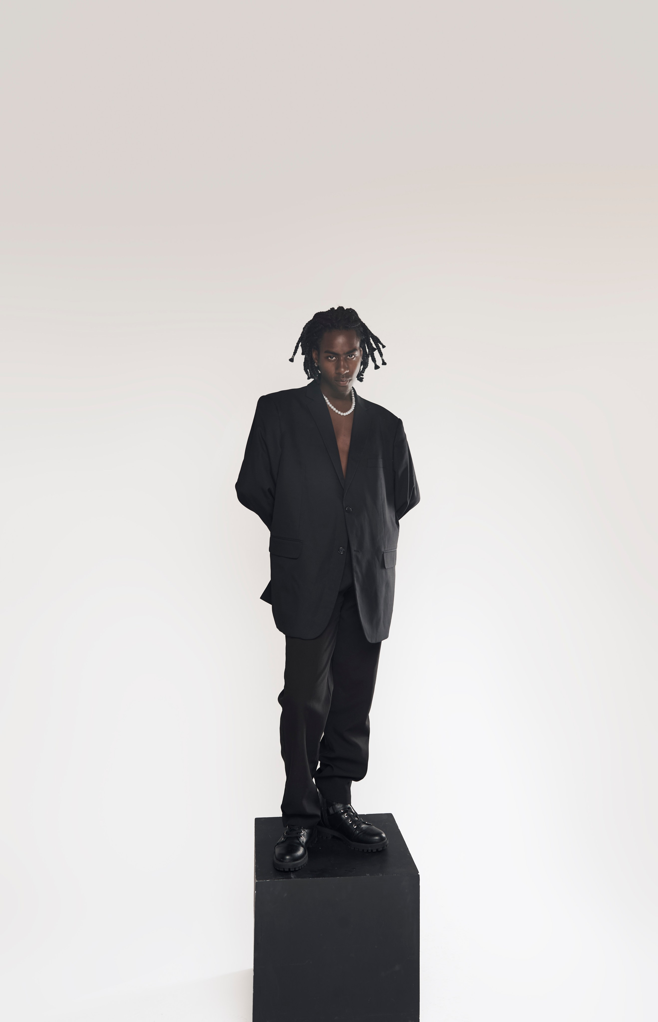 Professional fashion portrait of a male artist in black