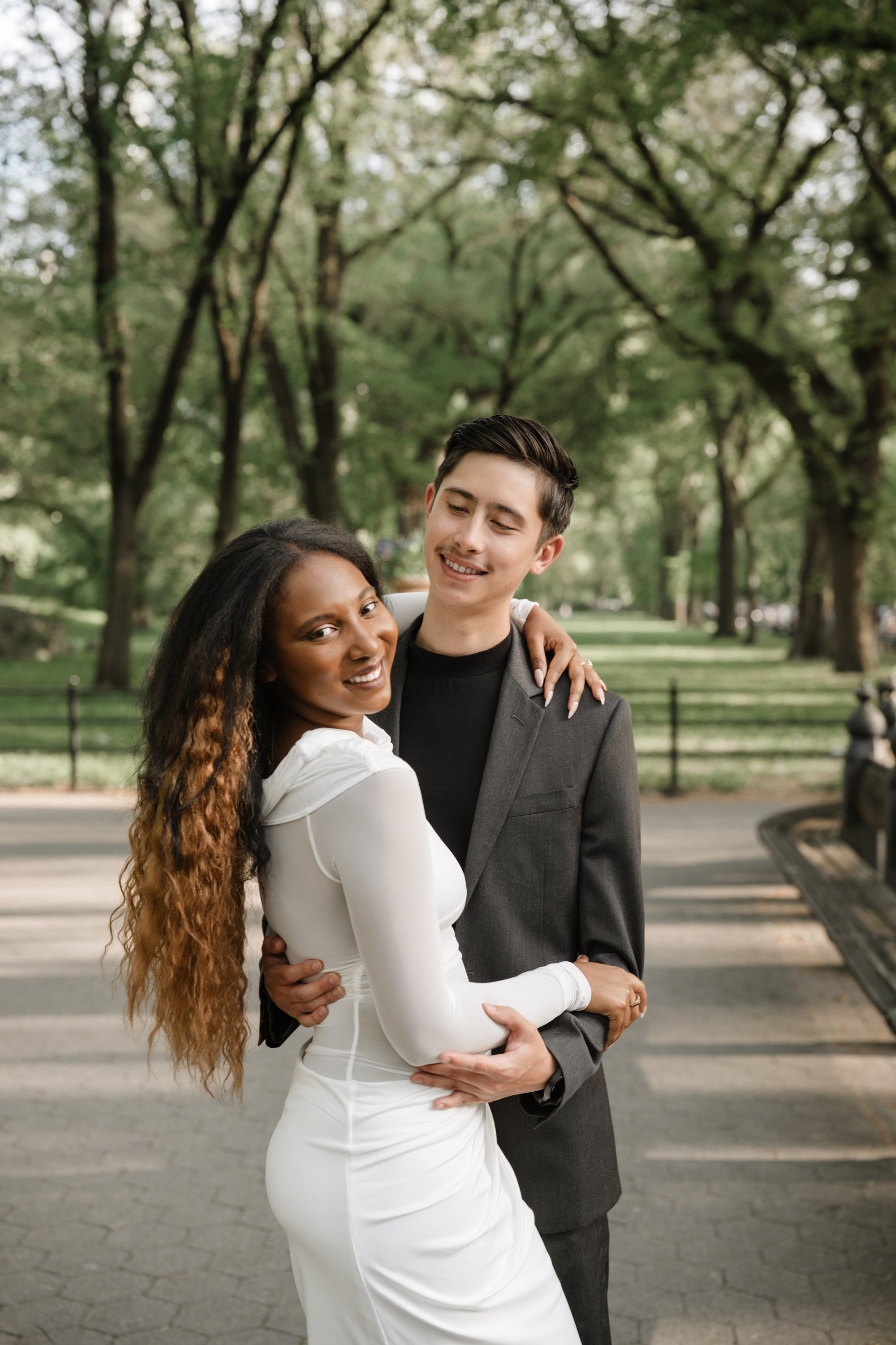 Engagement photo shoot in Central Park in spring. Portrait and wedding photographer in New York