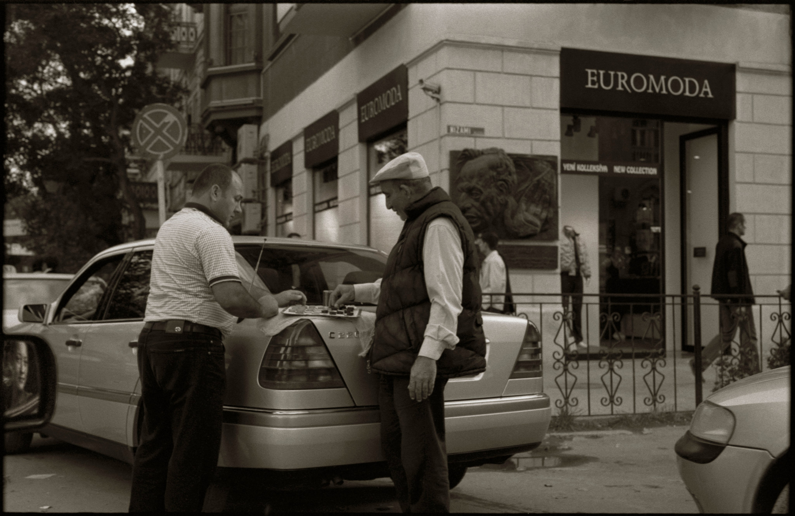 Taxi drivers waiting for customers.  Baku, 2008