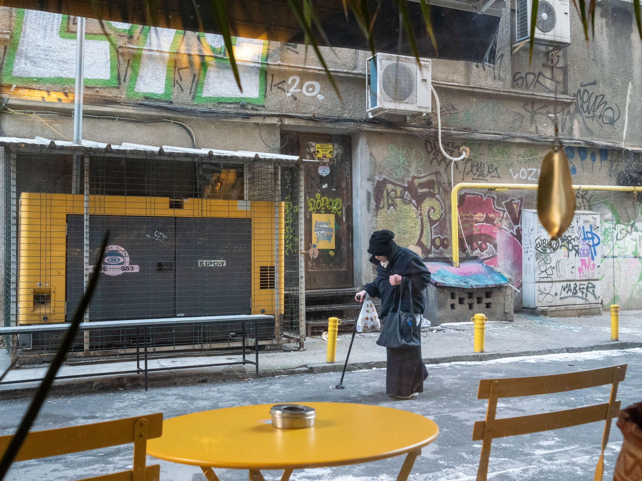 Color street. Humanistic street photographer in Bucharest