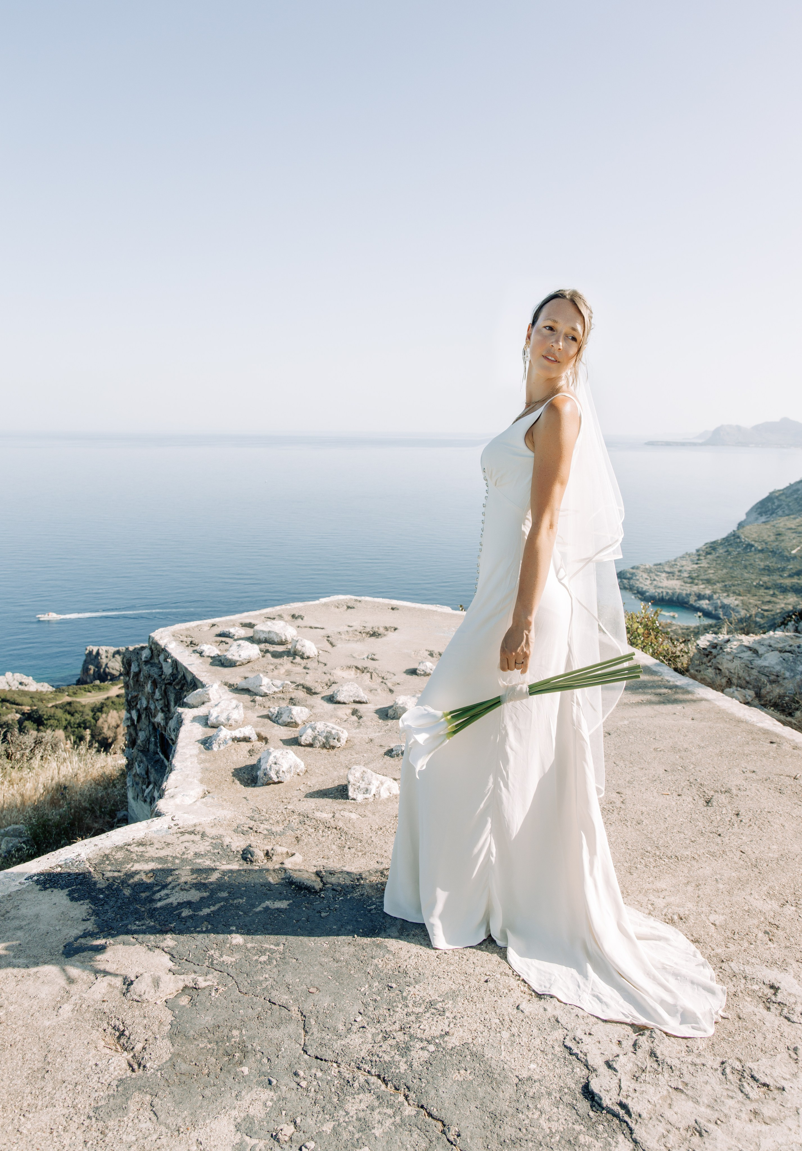 Ring exchange ceremony. Portrait- und Hochzeitsfotografin Irene Art Photo mit Sitz auf der griechischen Insel Rhodos