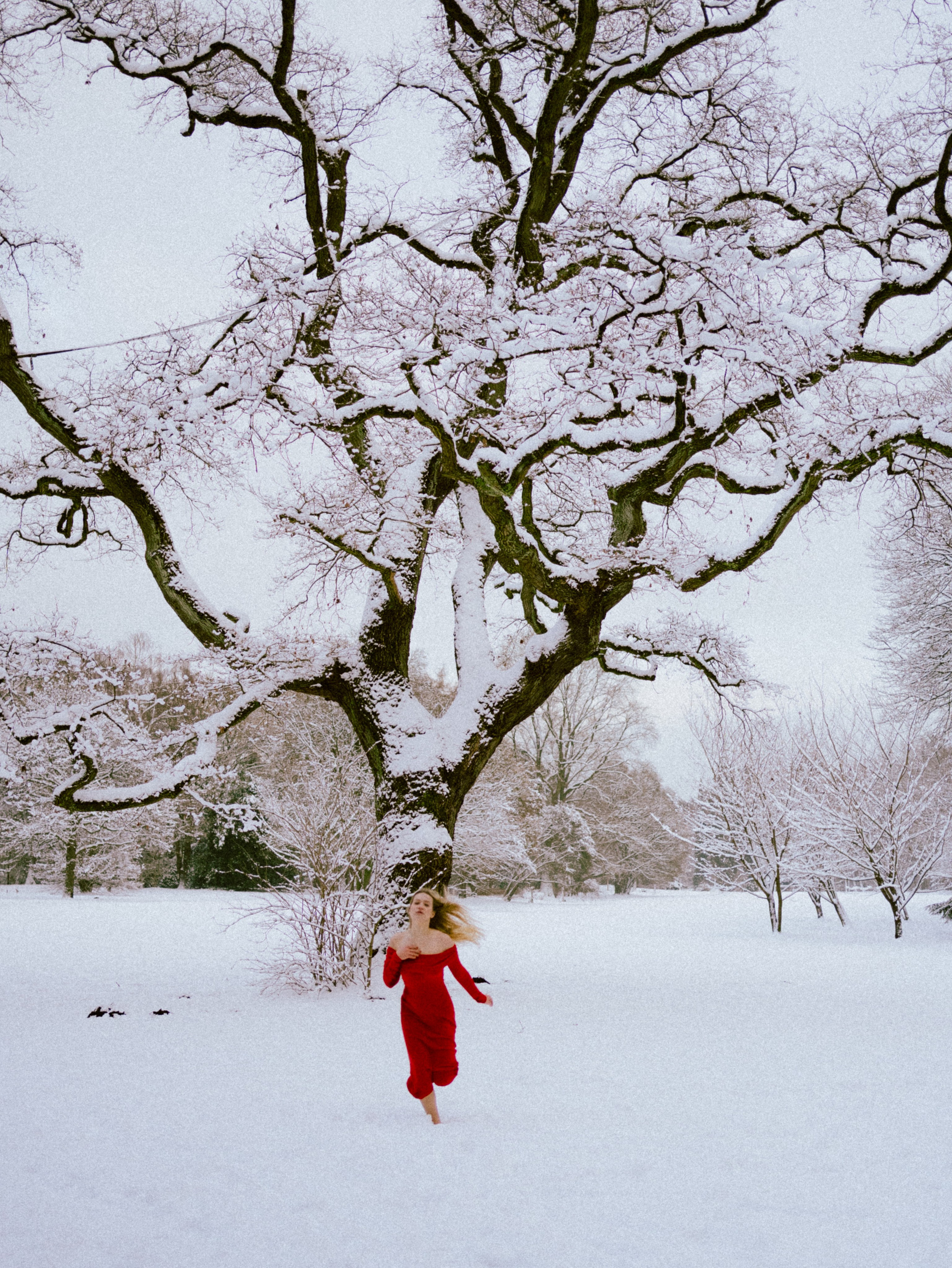 Red in the Snow. Alina Romanova | Creative & Fashion Photographer Hamburg