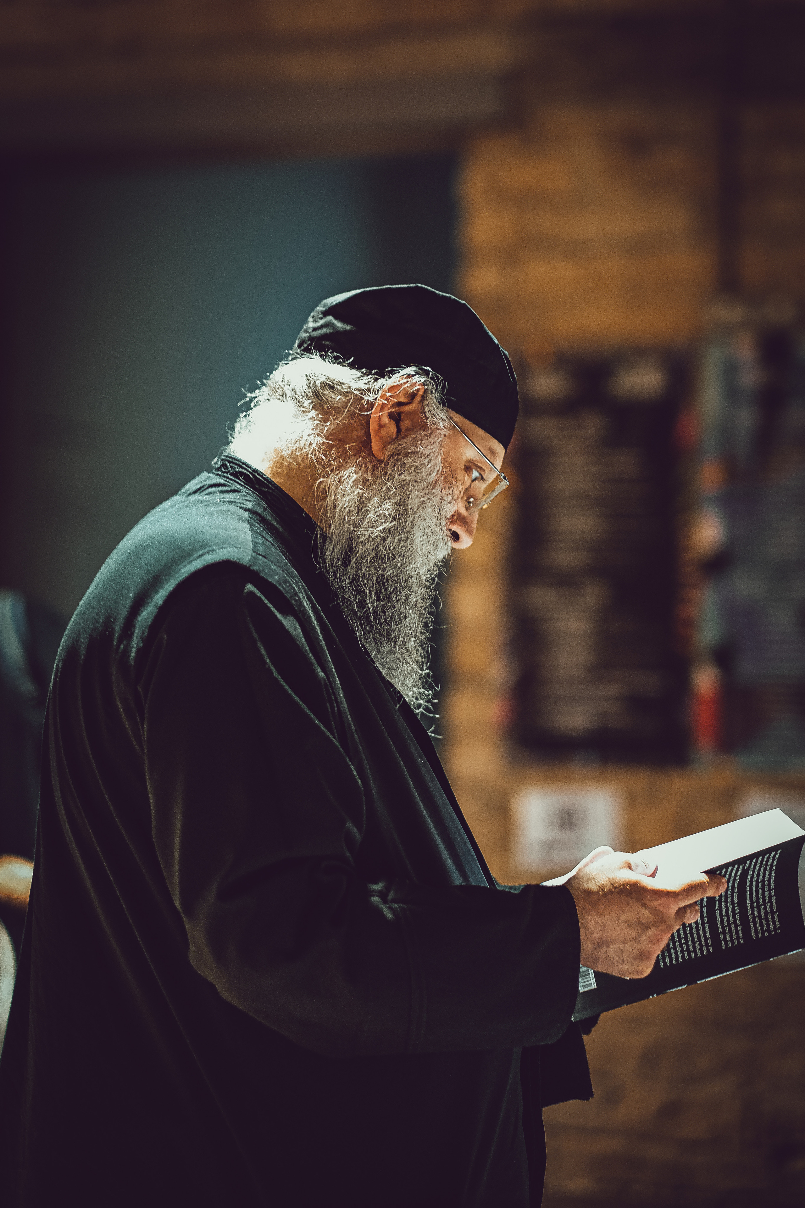 Priest at a book fair in Limassol | YuKoPhotography | YuKo Photography