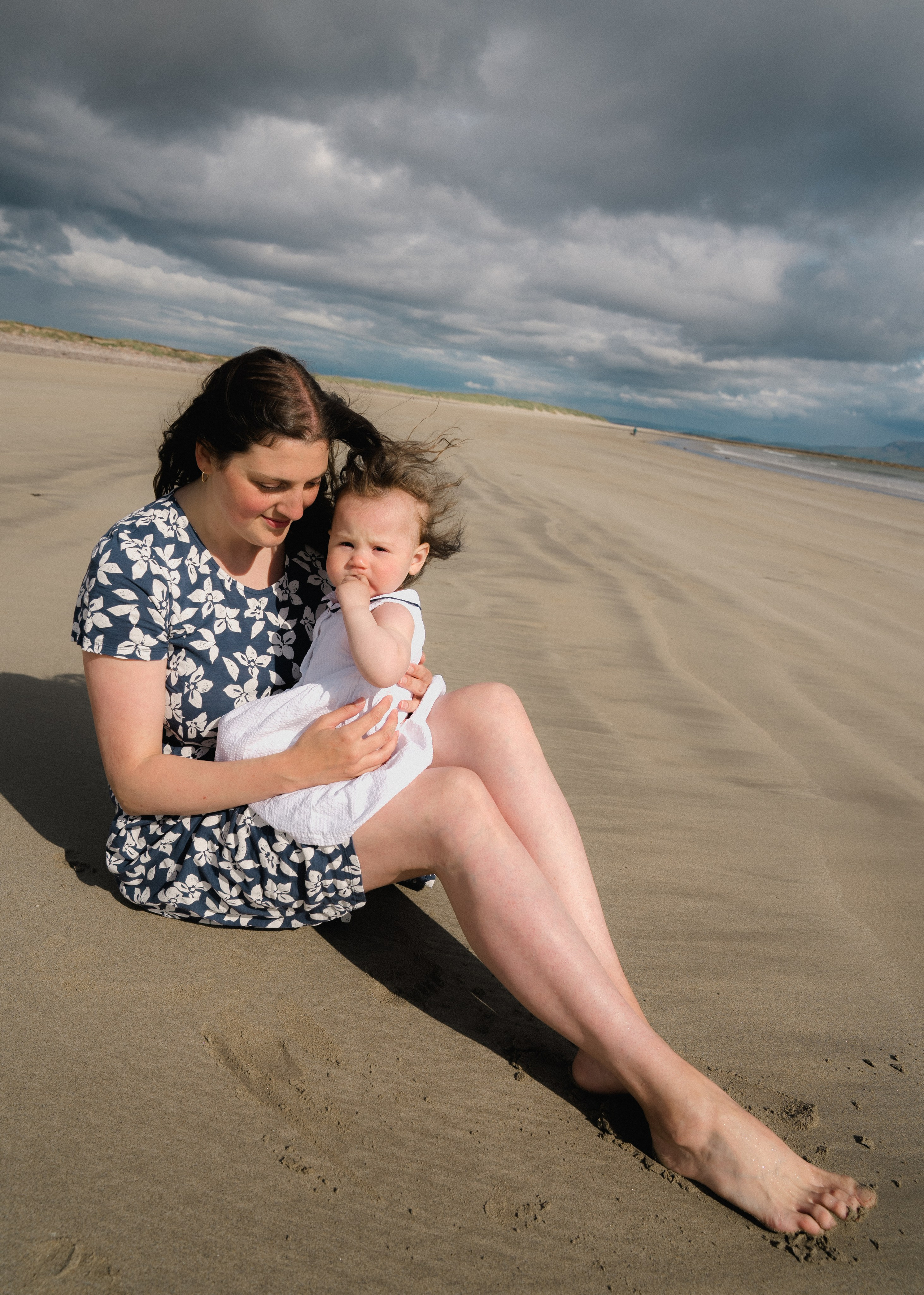 Darya and Mia at the ocean. Wedding and family photographer Ireland