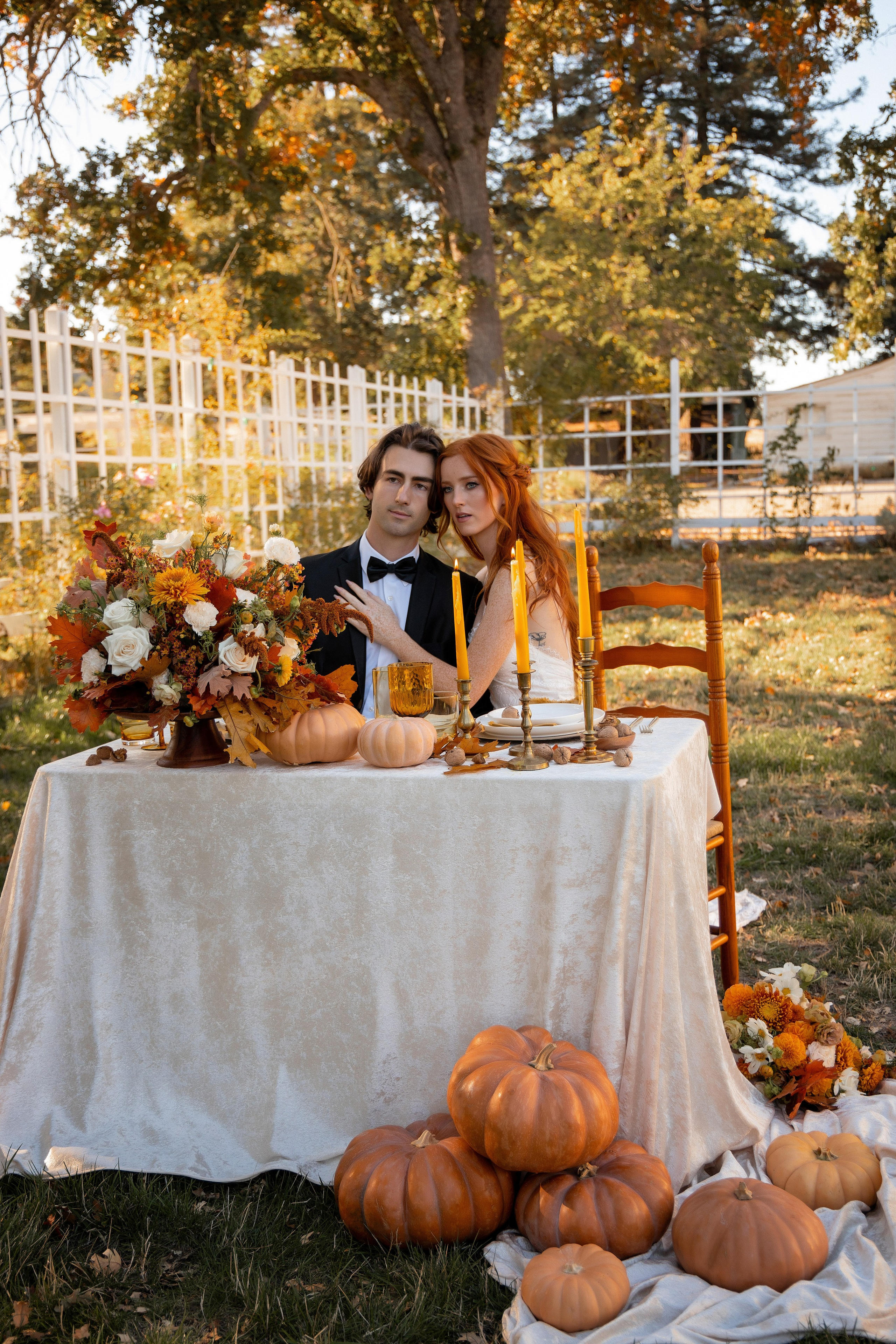 The photographer captures the moment of cutting the wedding cake during the Bay Area photo session.