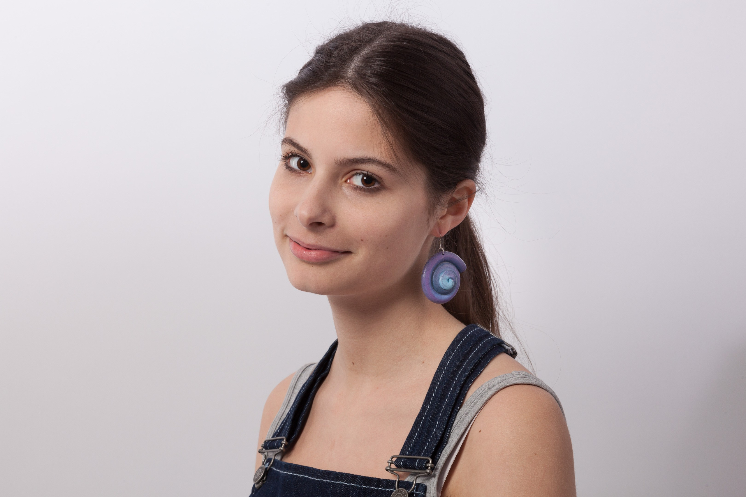 Portrait of a young girl on white studio background - photographer Andrey Dunin