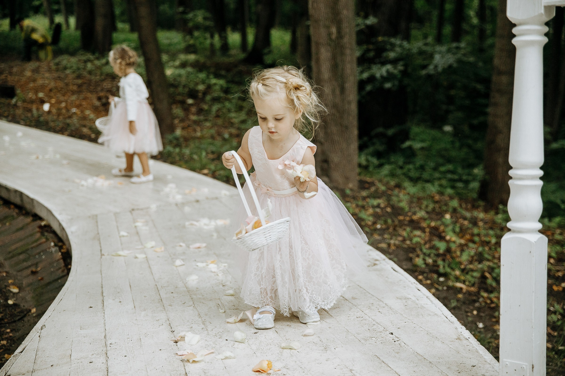 Flower girl in ceremony, by Cornwall editorial photographer.